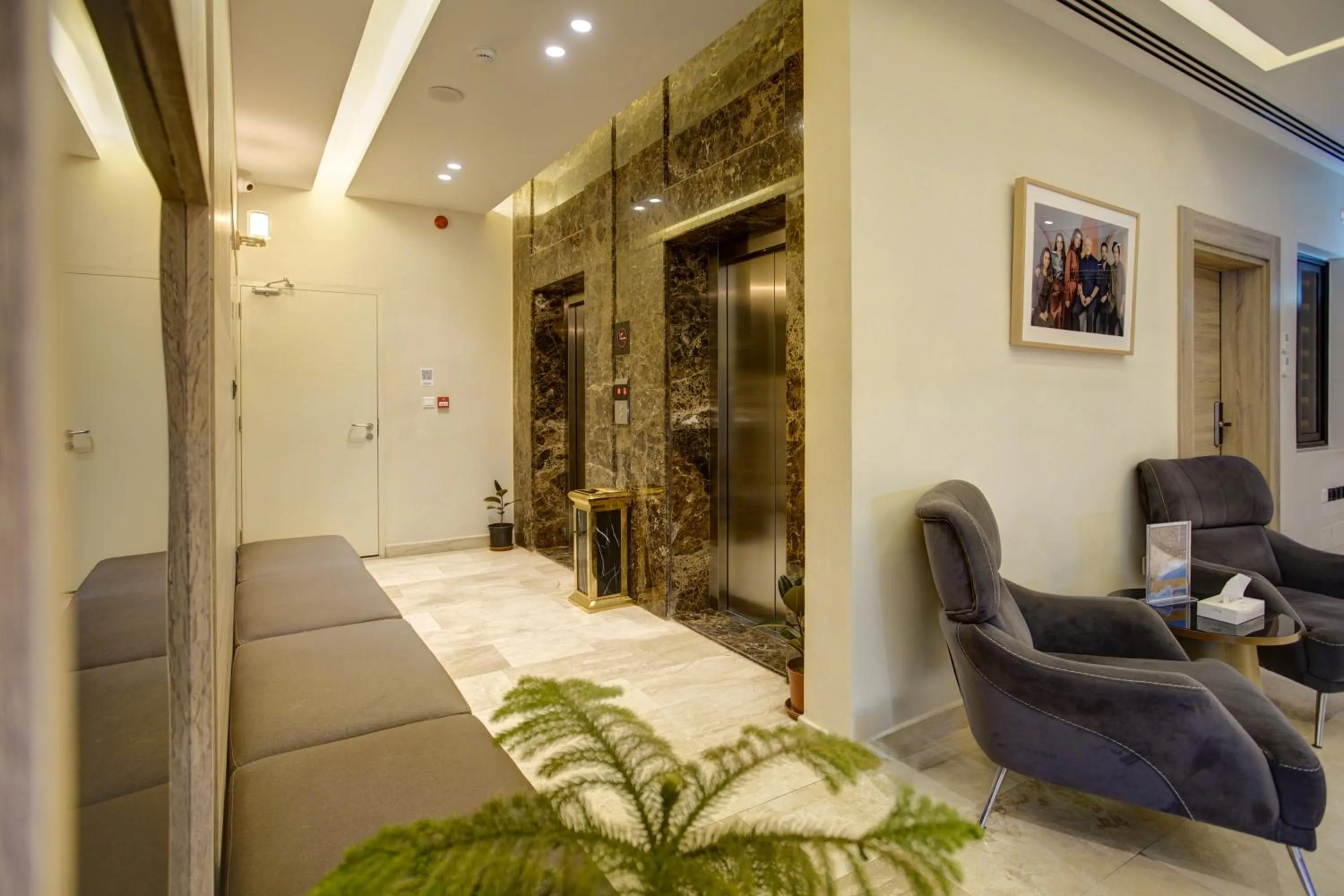 Seating area in Luciana Hotel by FHM