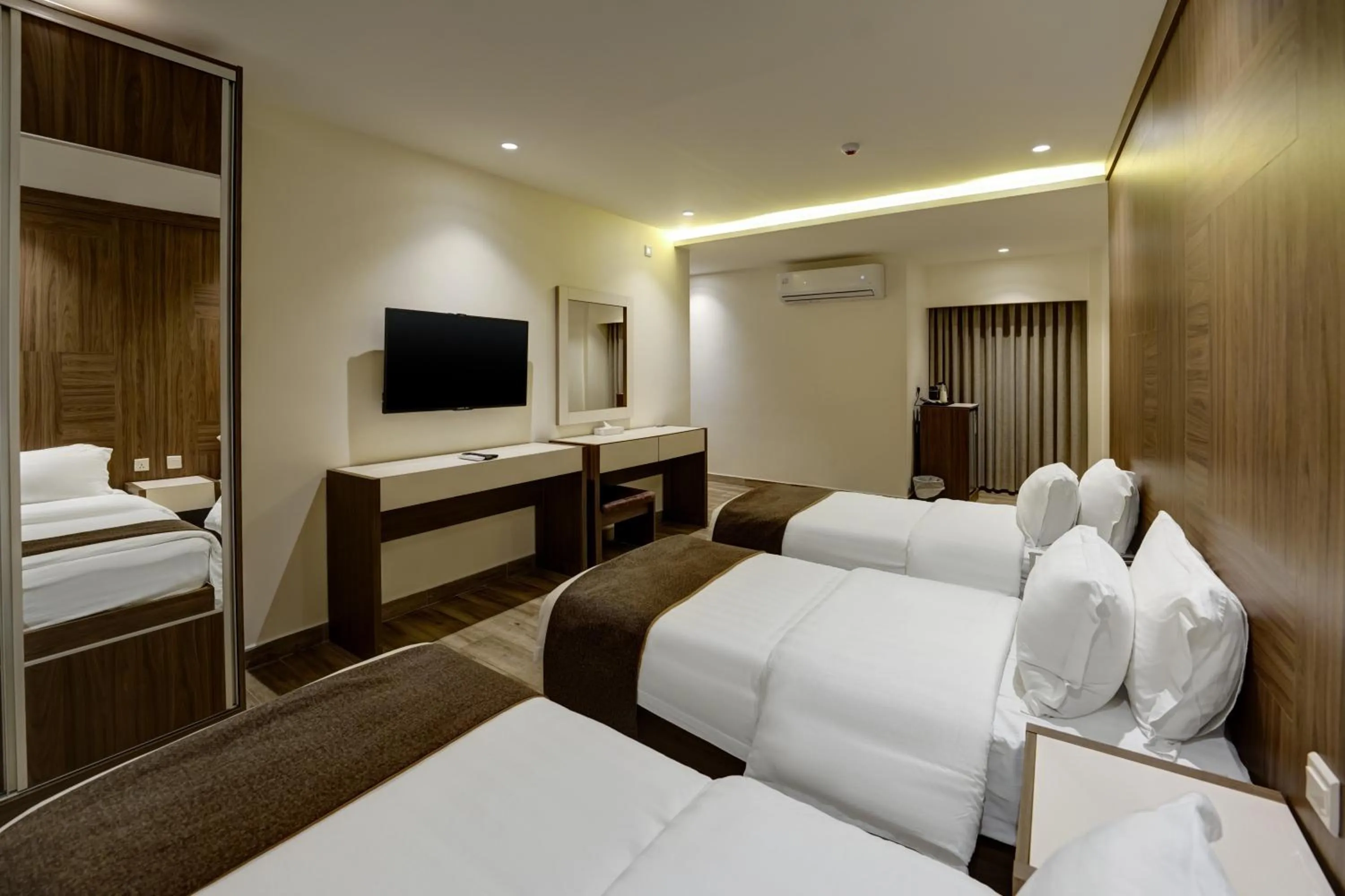 Communal lounge/ TV room, Bed in Luciana Hotel by FHM