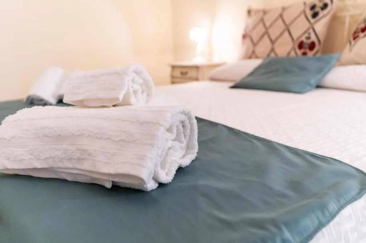 Bed in Errico Suite e Rooms