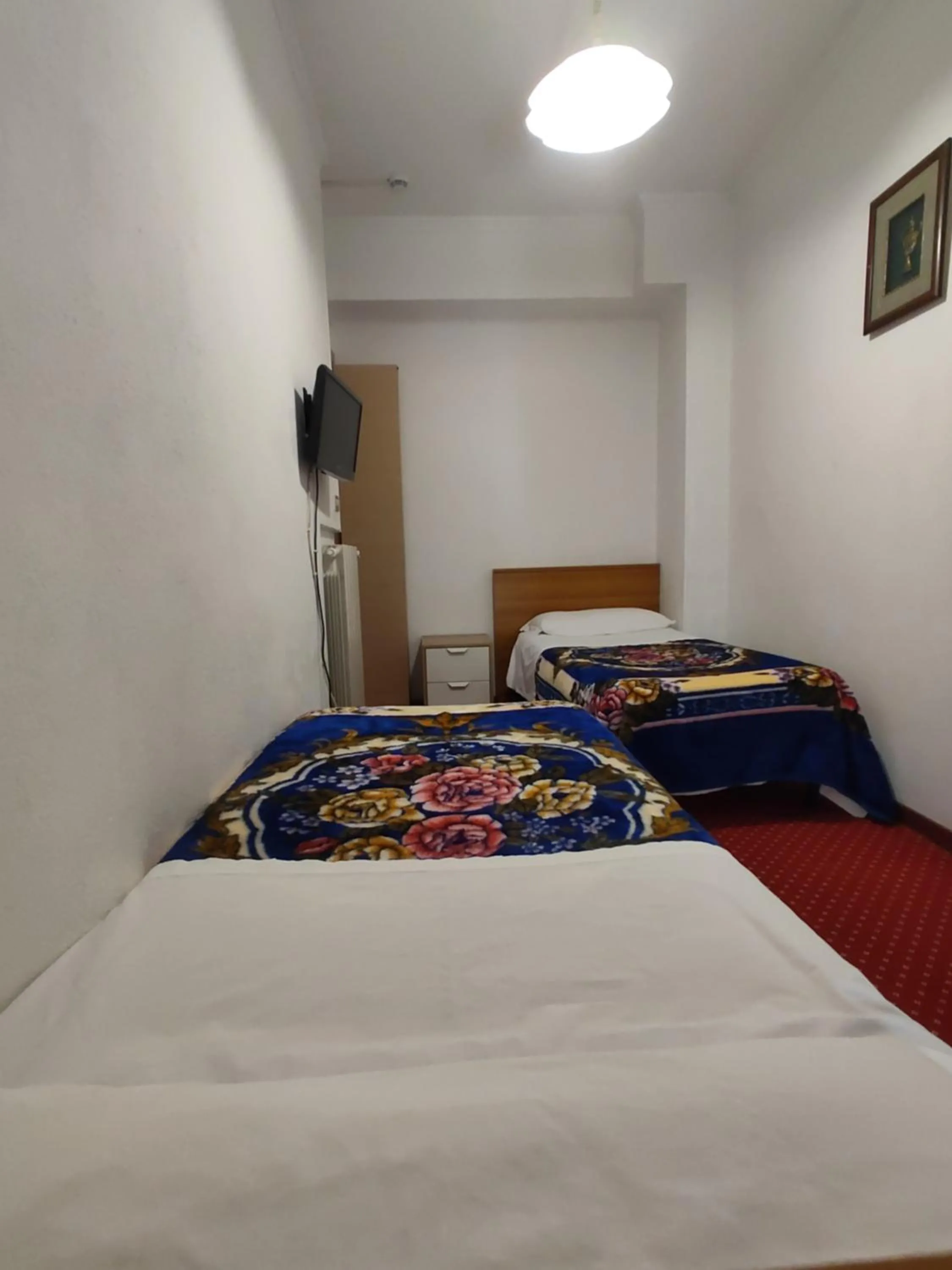 Bed in Hotel Sorriso