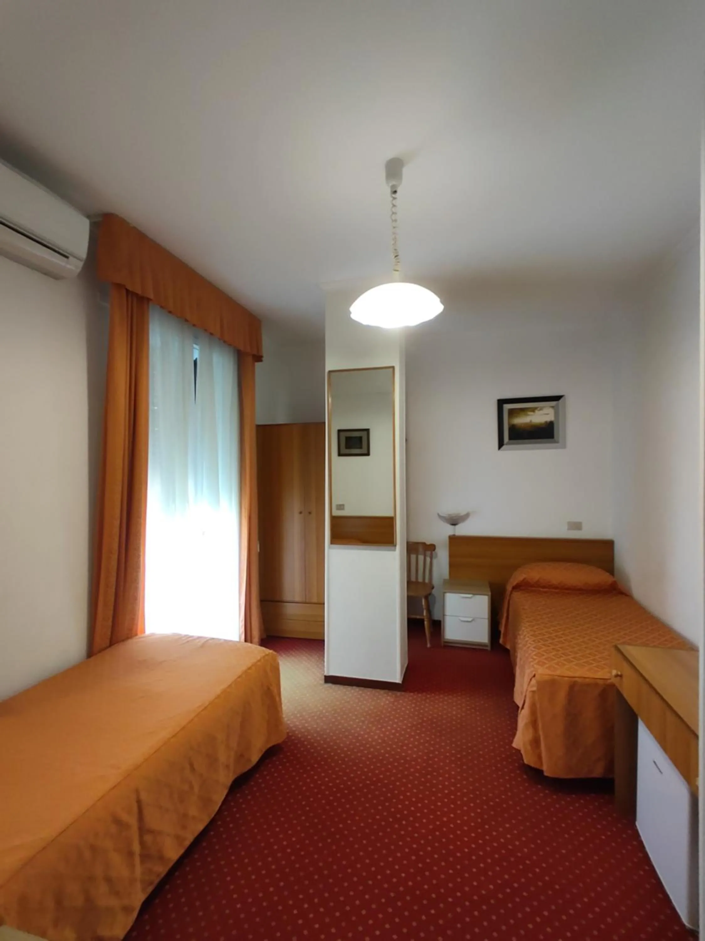 Bed in Hotel Sorriso