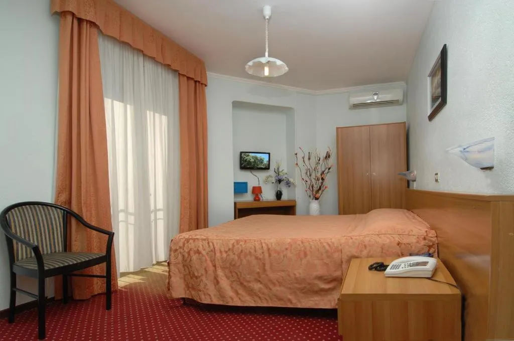 Bed in Hotel Sorriso
