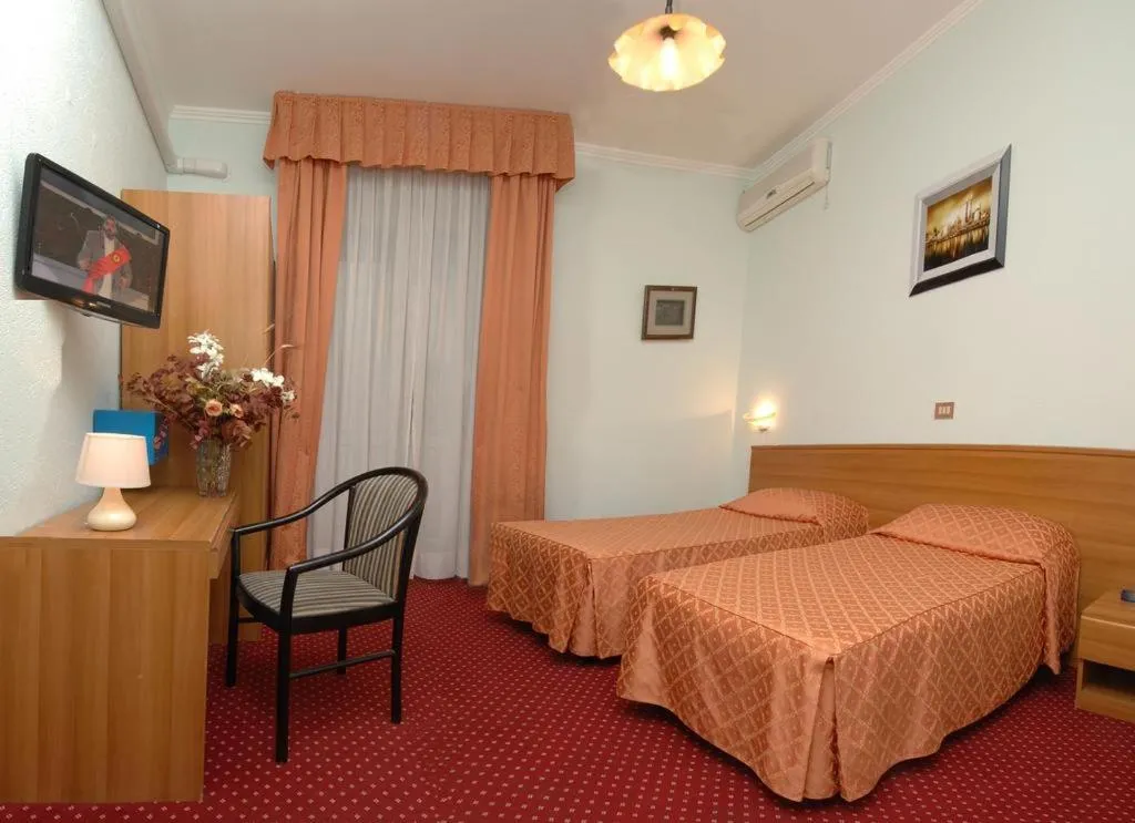 Bed in Hotel Sorriso