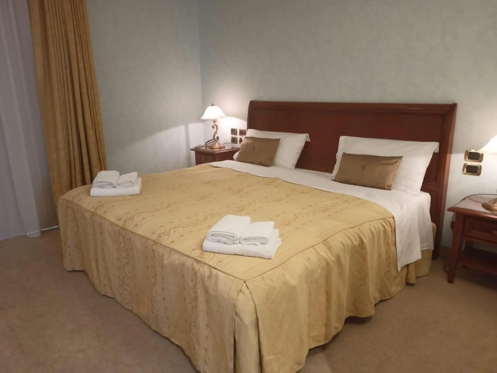 Bed in Gardenia Hotel