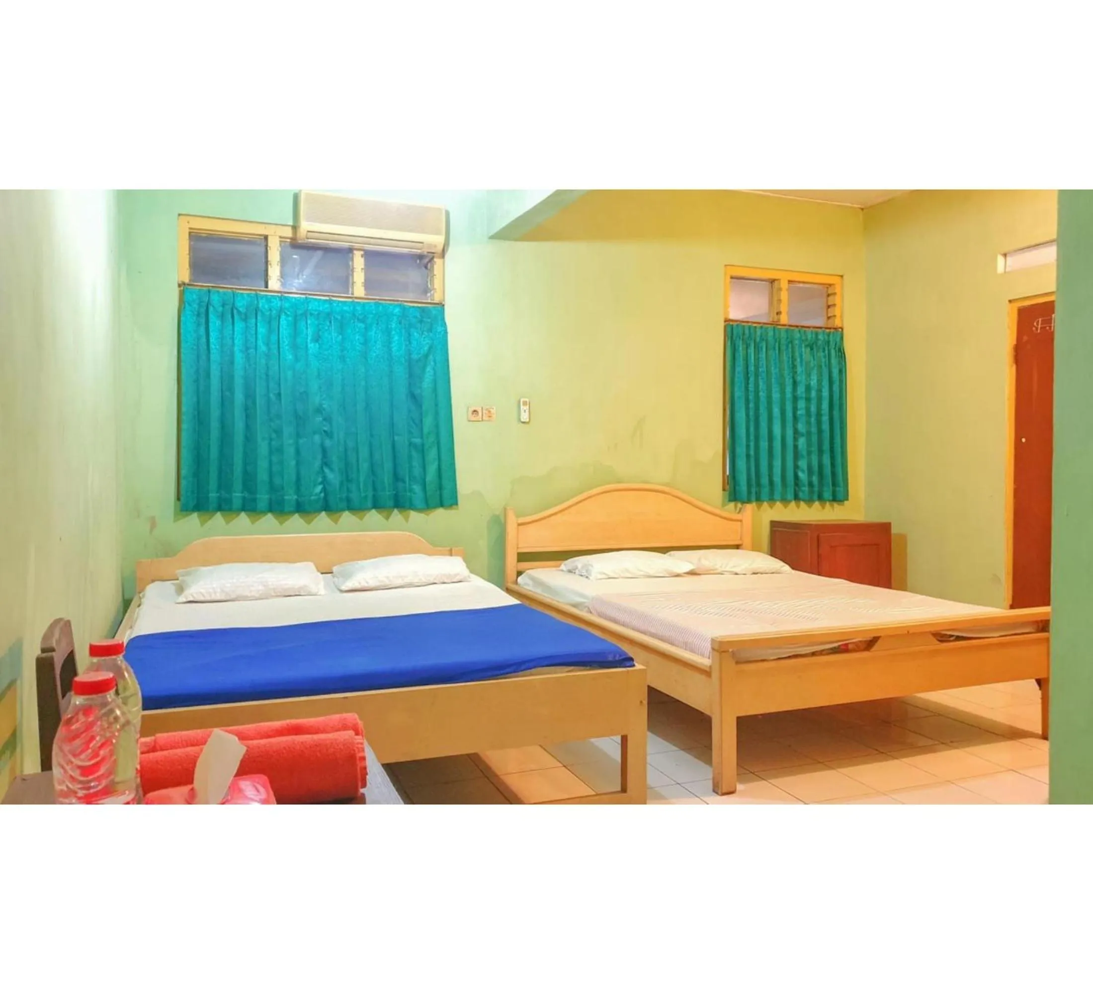 Bedroom, Bed in Hotel Jaya Kusuma near Candi Prambanan Mitra RedDoorz