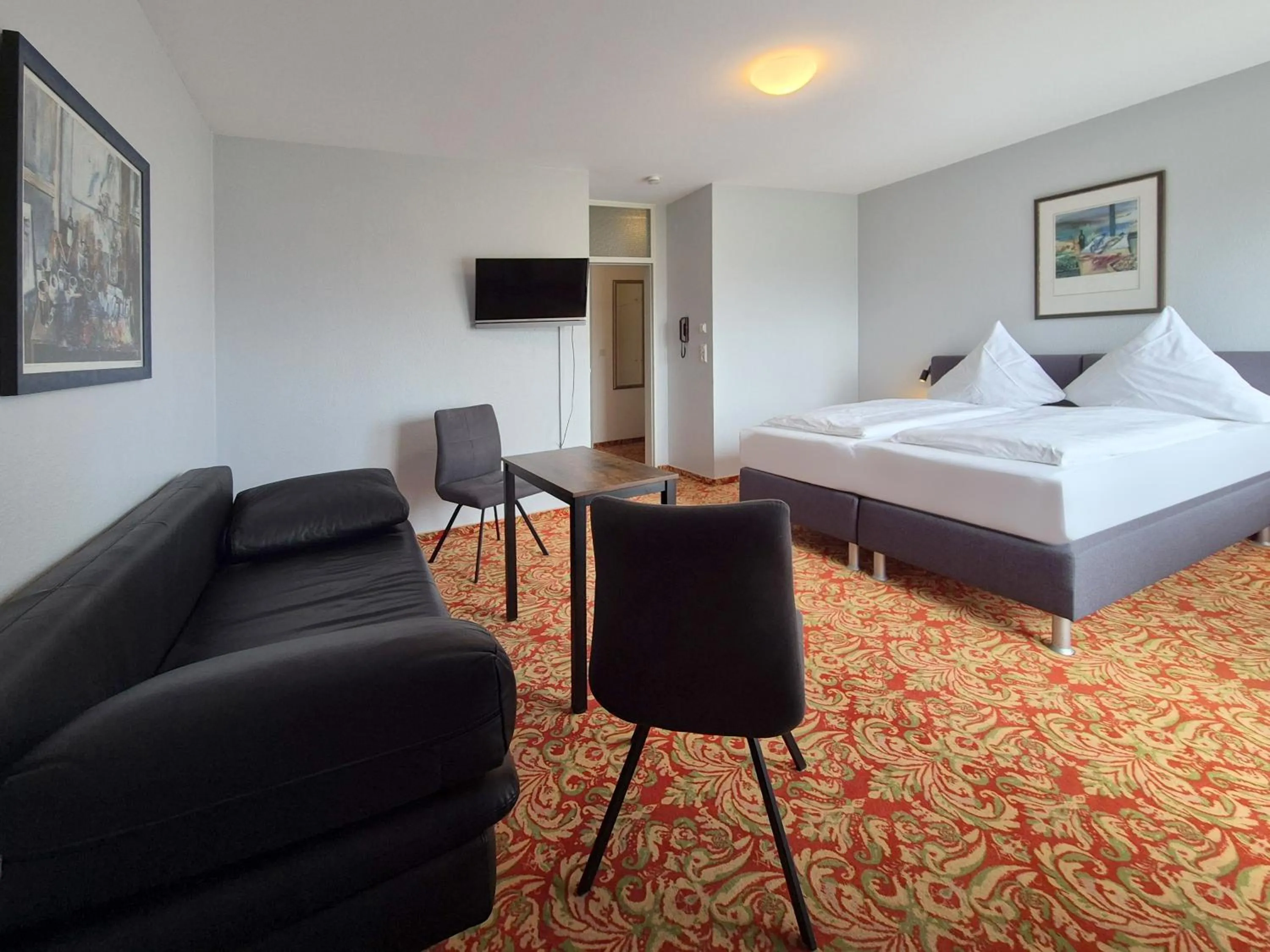 Bed in Hotel Schachener Hof