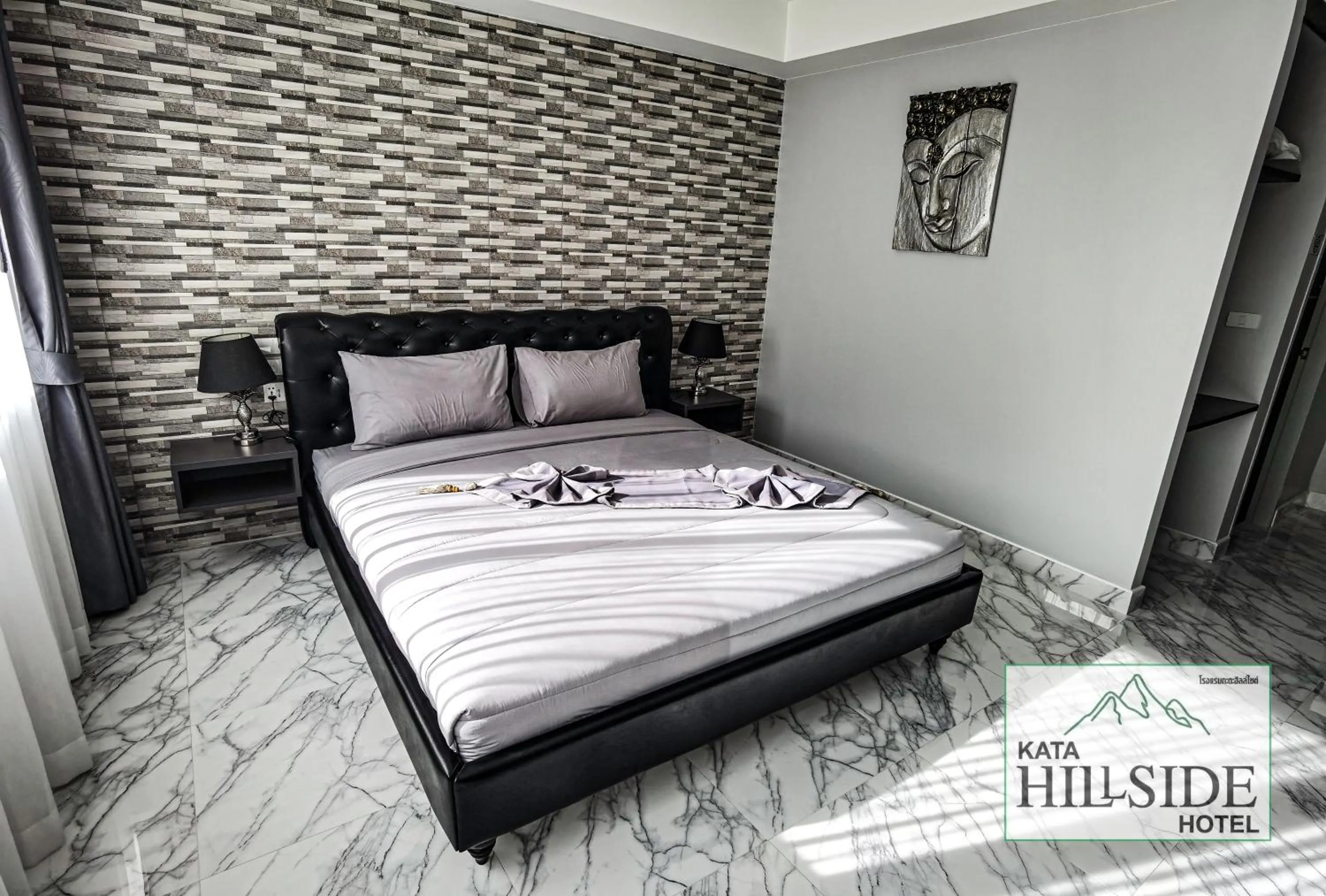 Bed in Kata Hillside Hotel