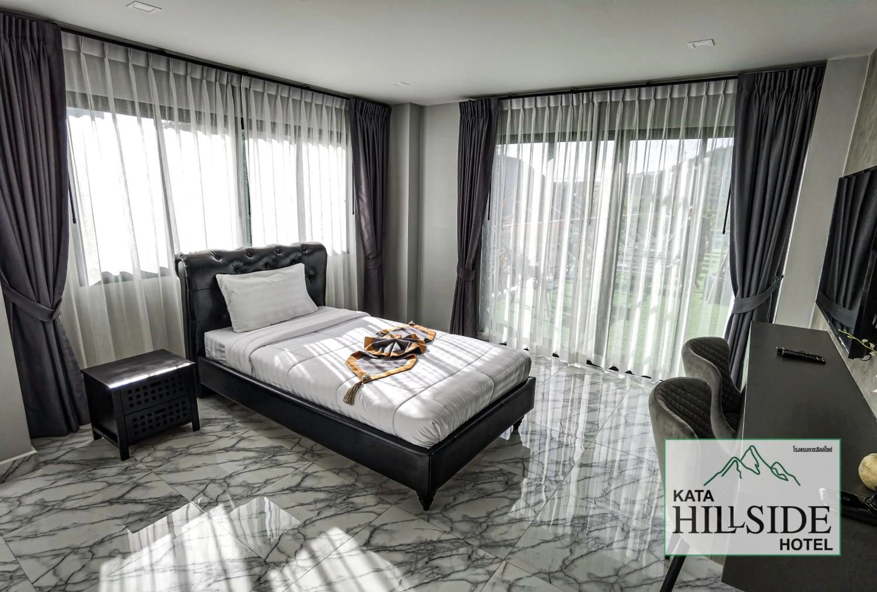 Bed in Kata Hillside Hotel