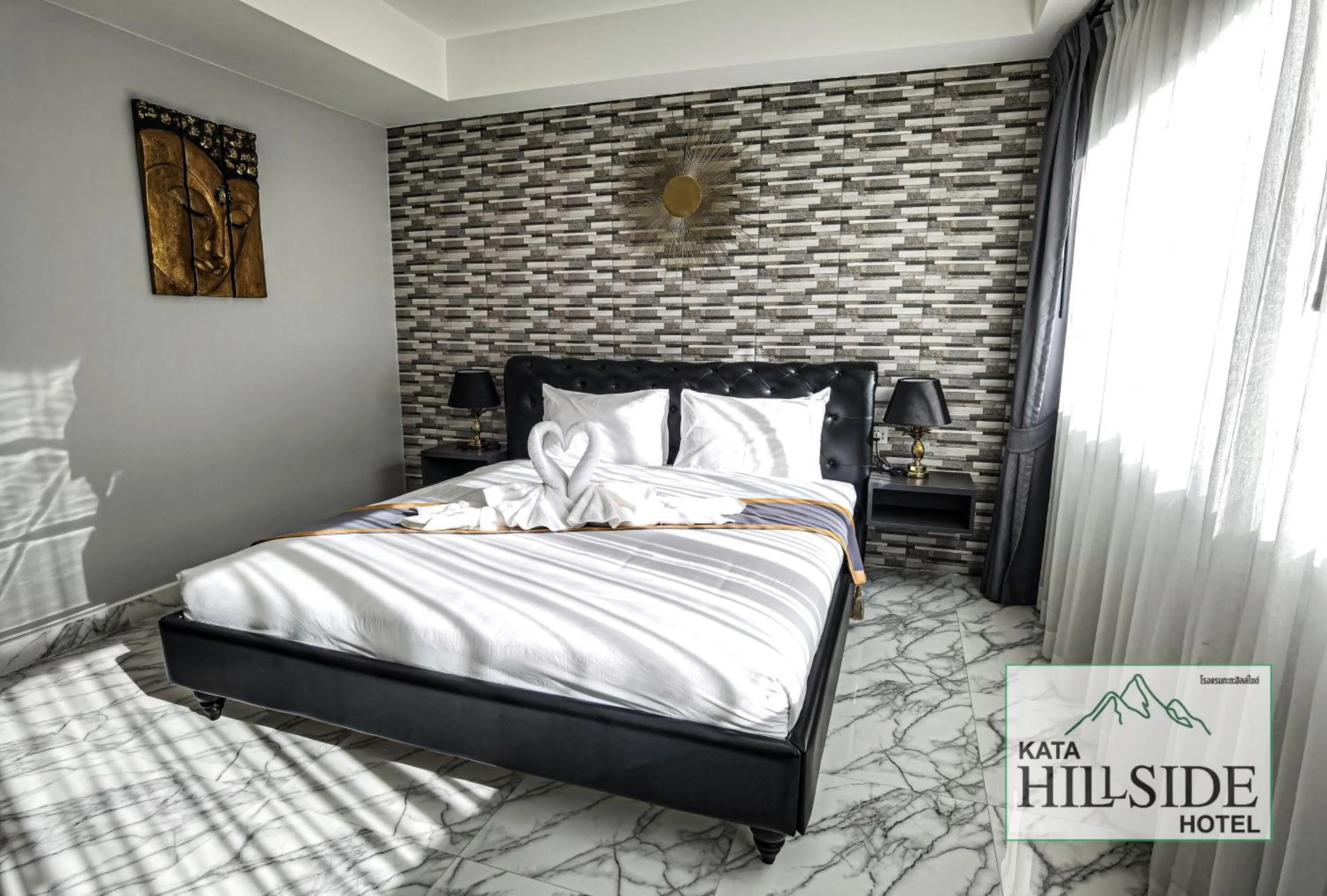 Bed in Kata Hillside Hotel