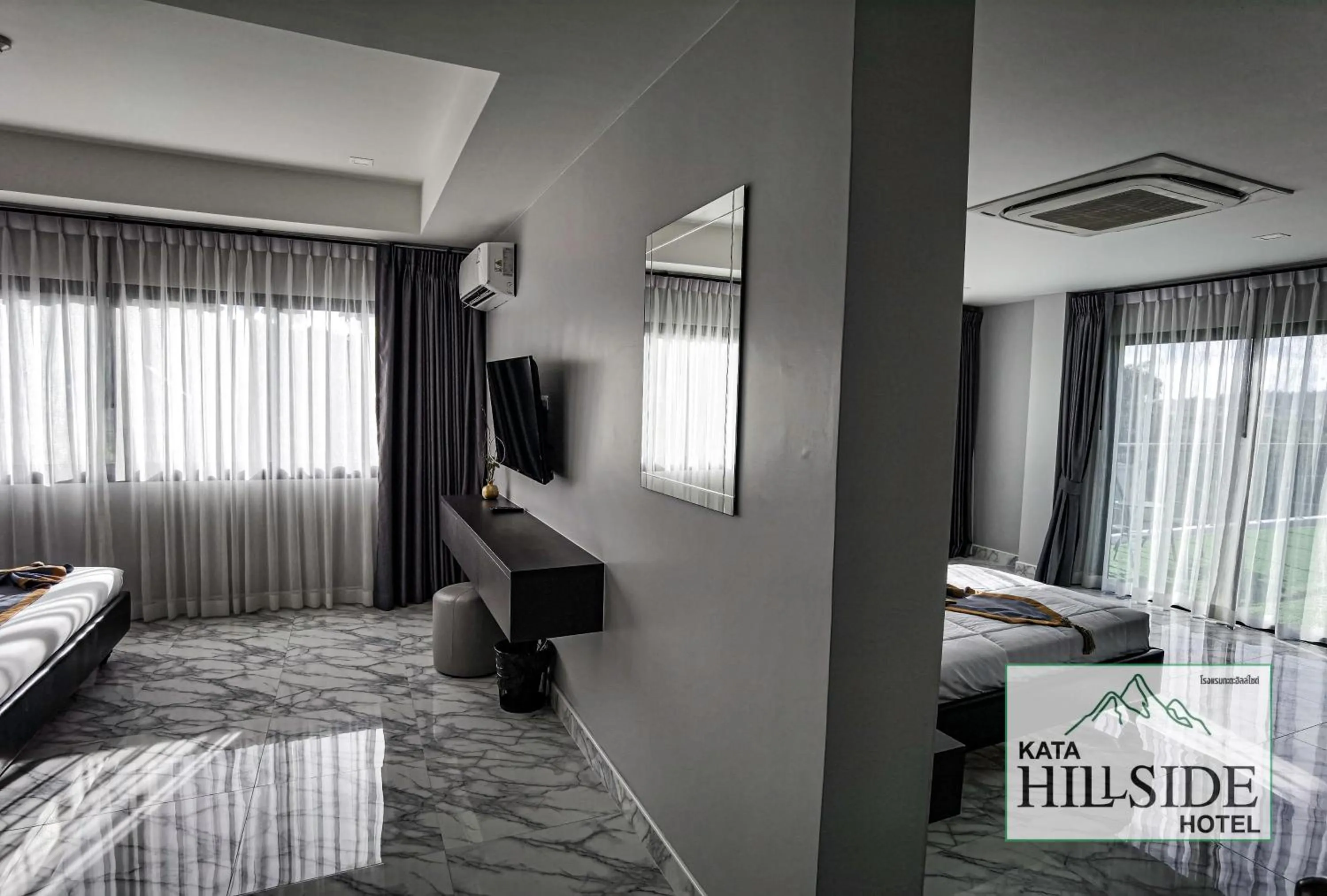 Bed in Kata Hillside Hotel