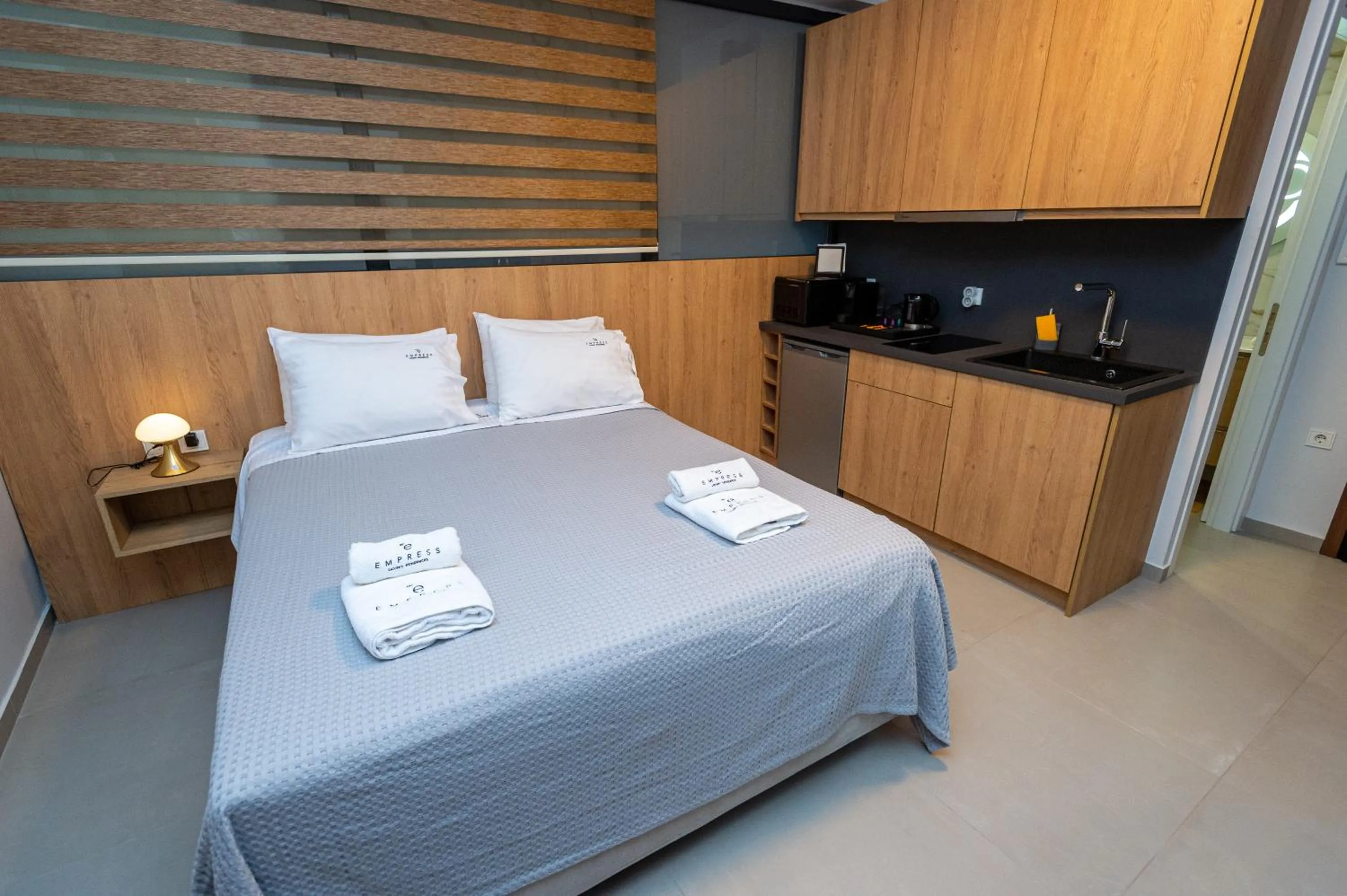 Bed in Empress Luxury Residences