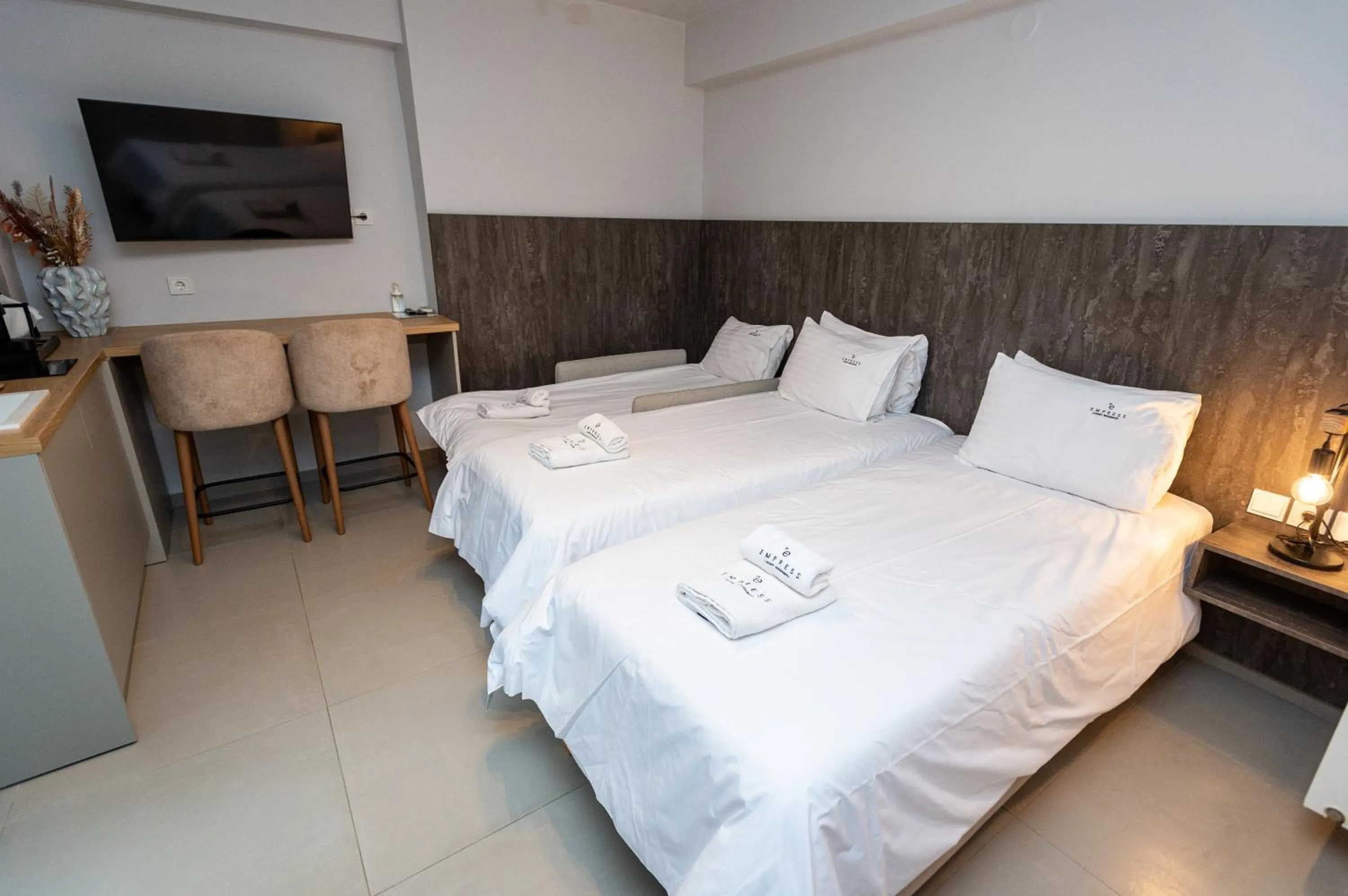 Bed in Empress Luxury Residences