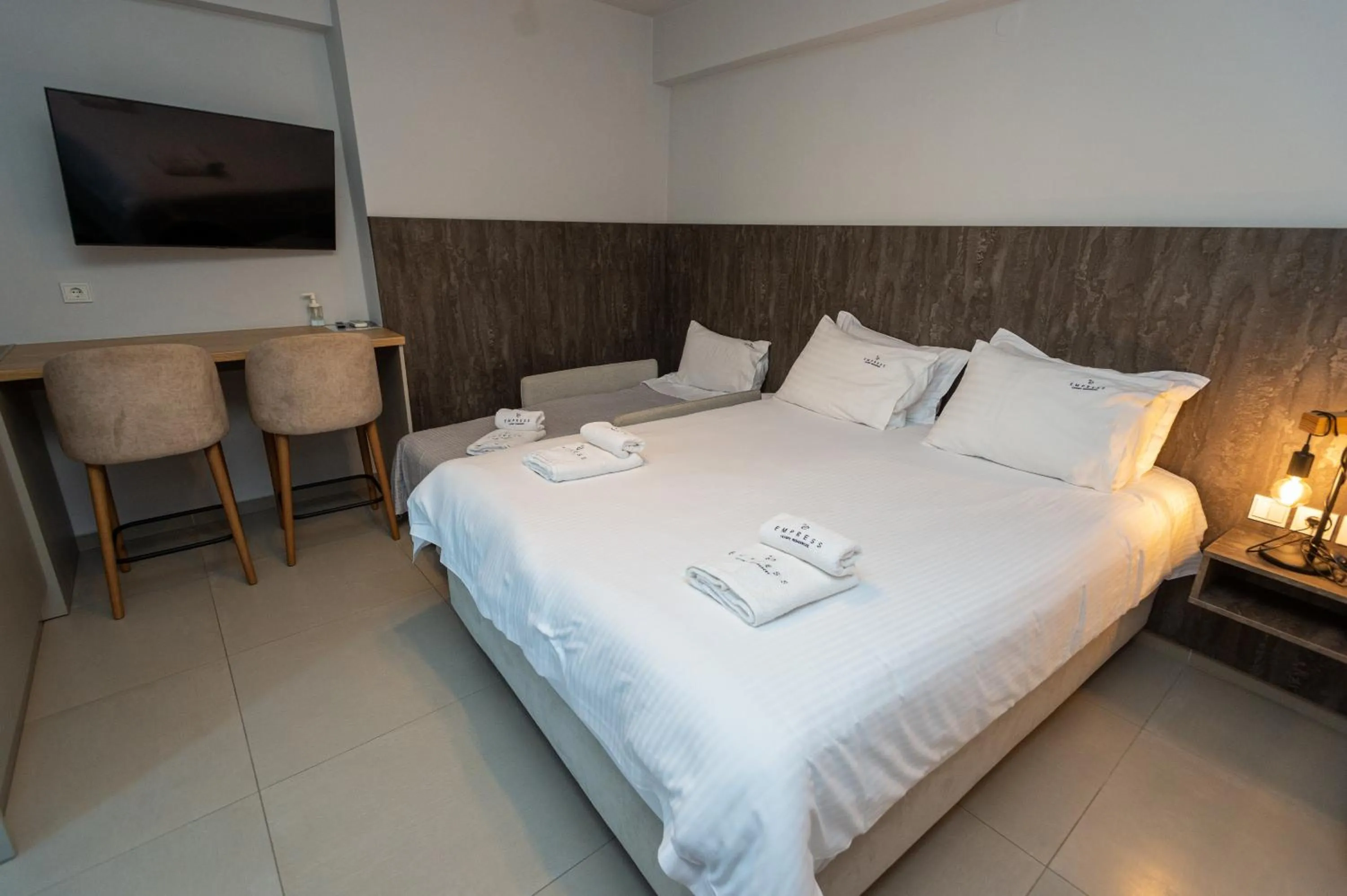 Bed in Empress Luxury Residences