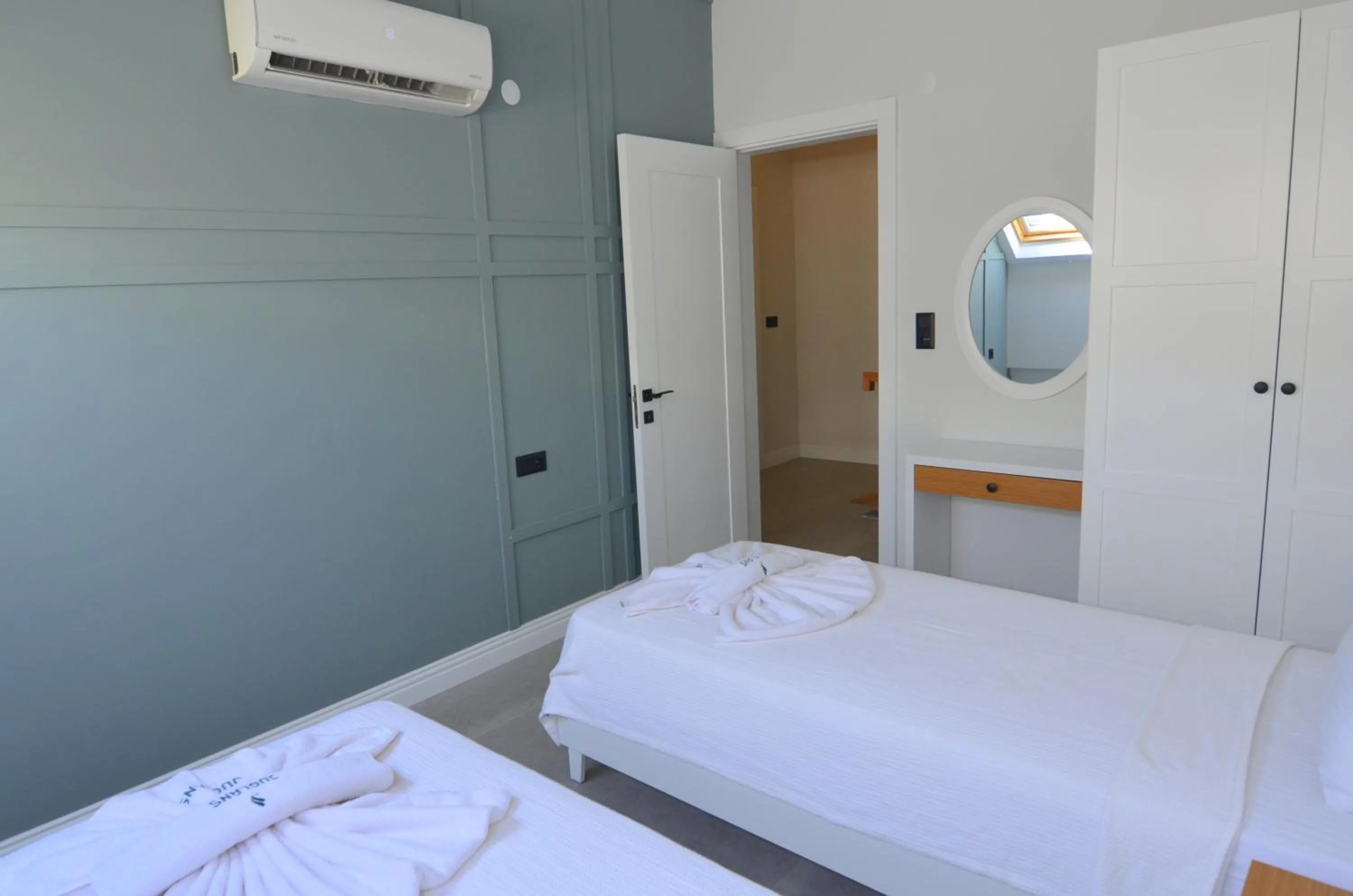 Bed in Juglans Suites