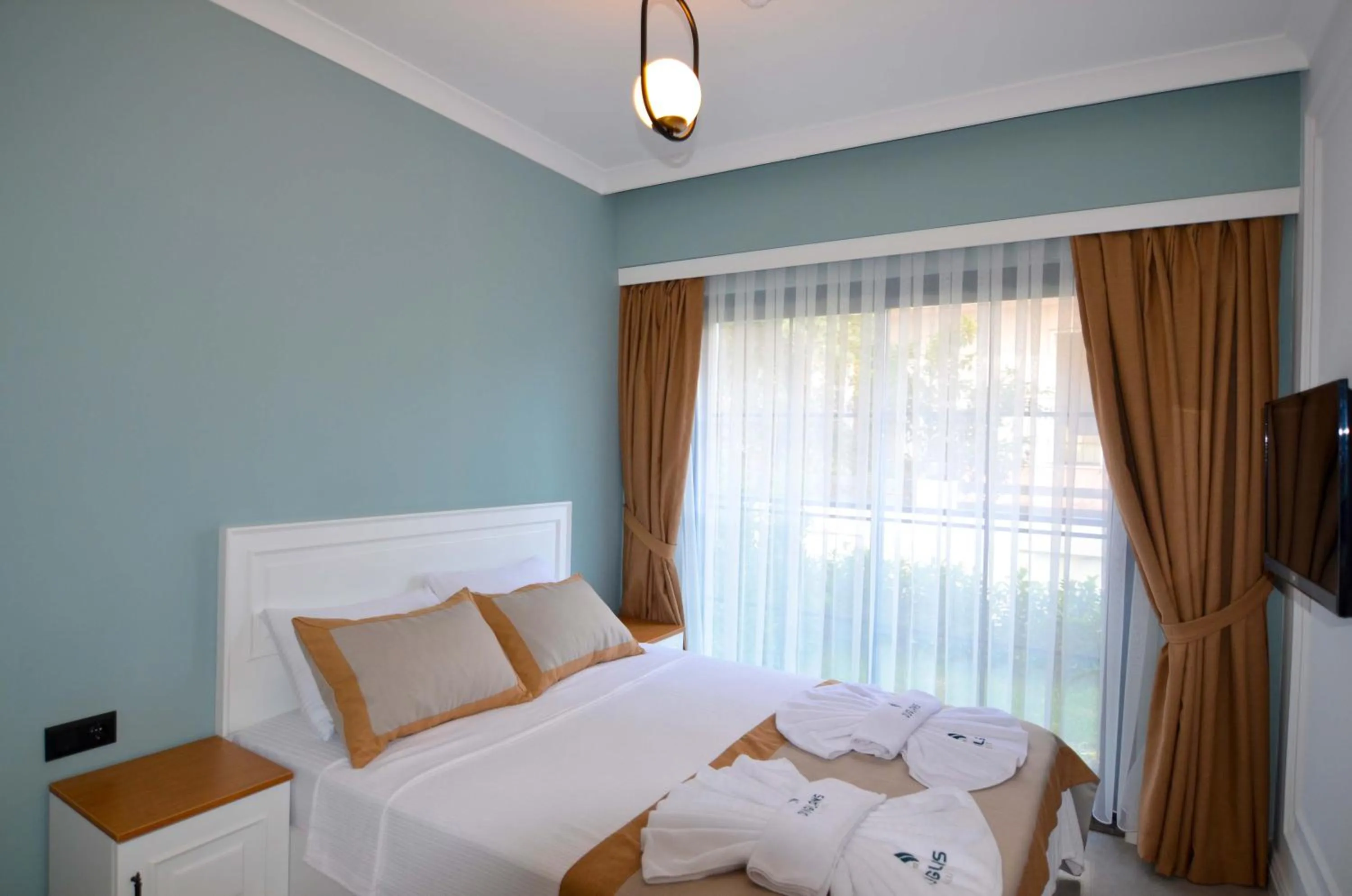 Bed in Juglans Suites