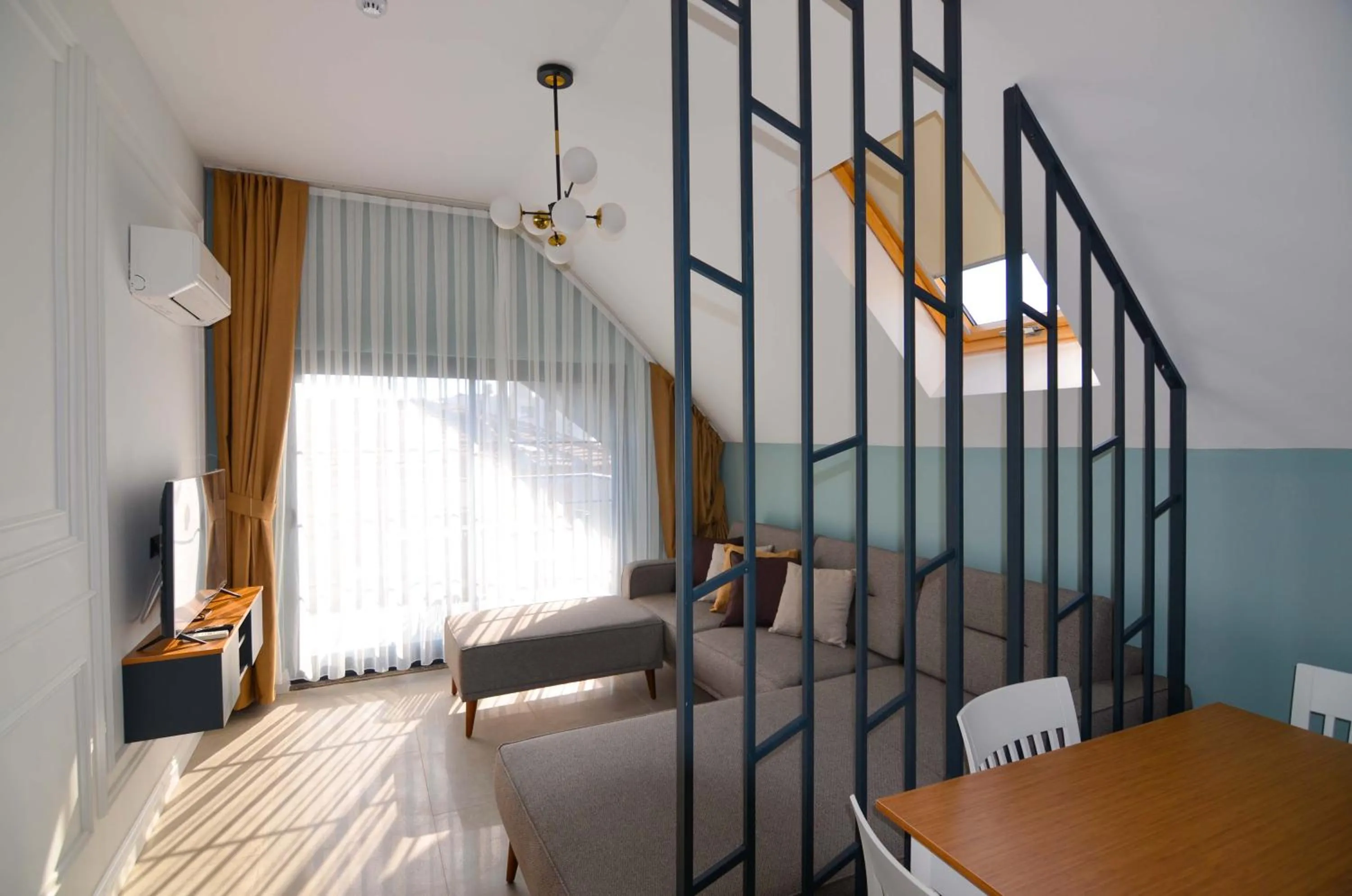 Living room, Bed in Juglans Suites