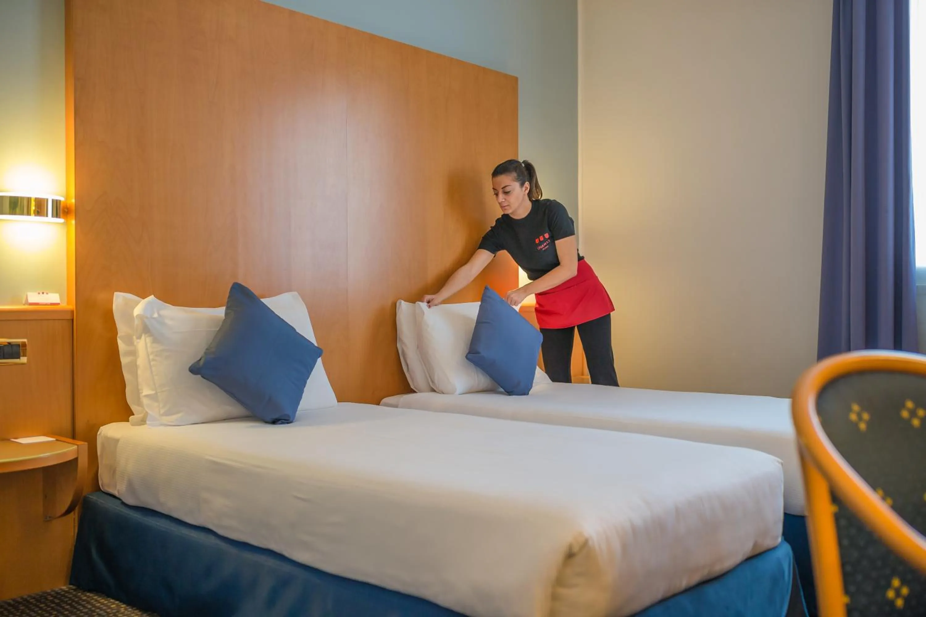 Staff, Bed in UNA HOTELS Occhiobello