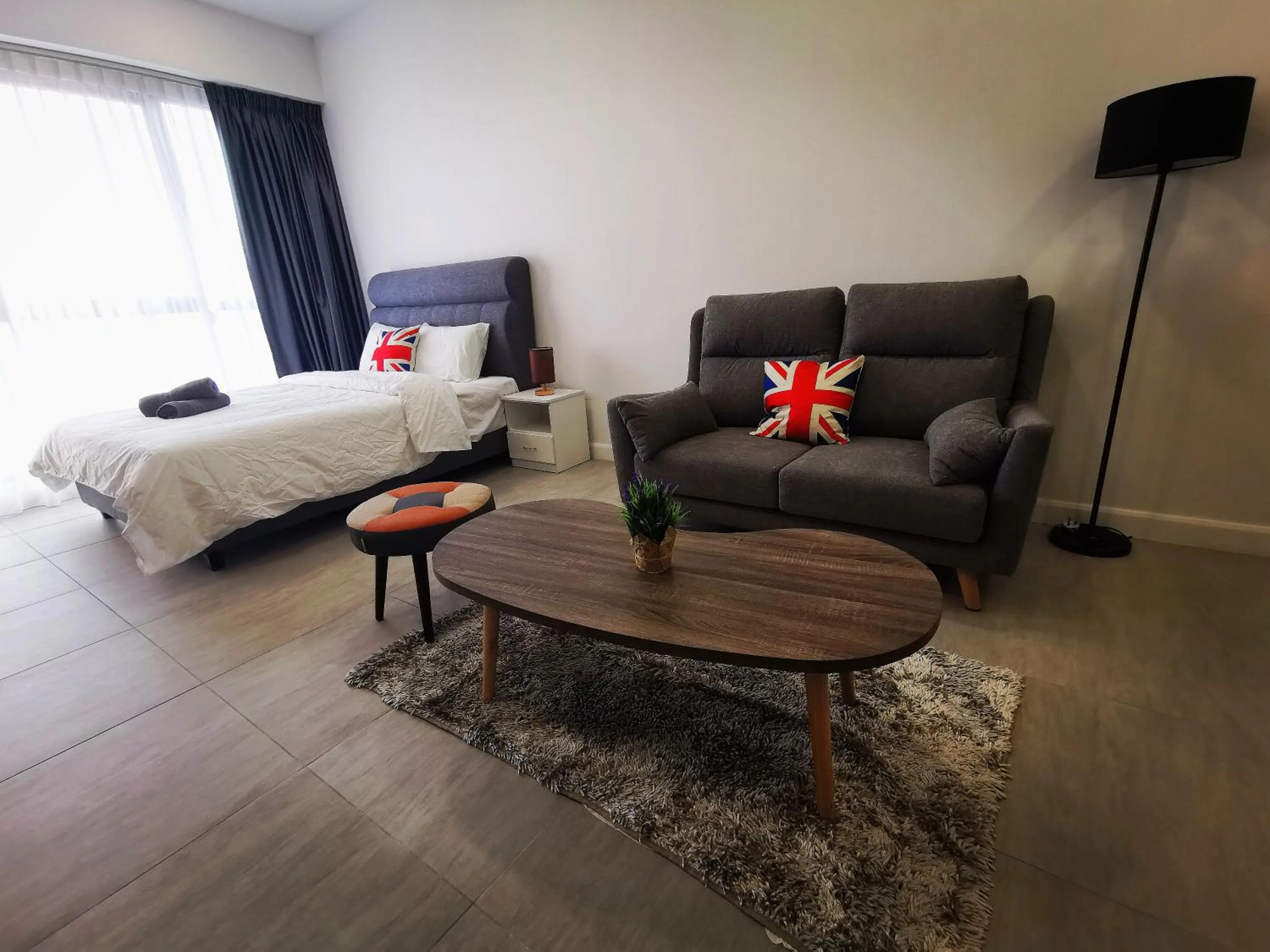 Living room, Bed in Bell Suite - The Premium Suite @ Sepang