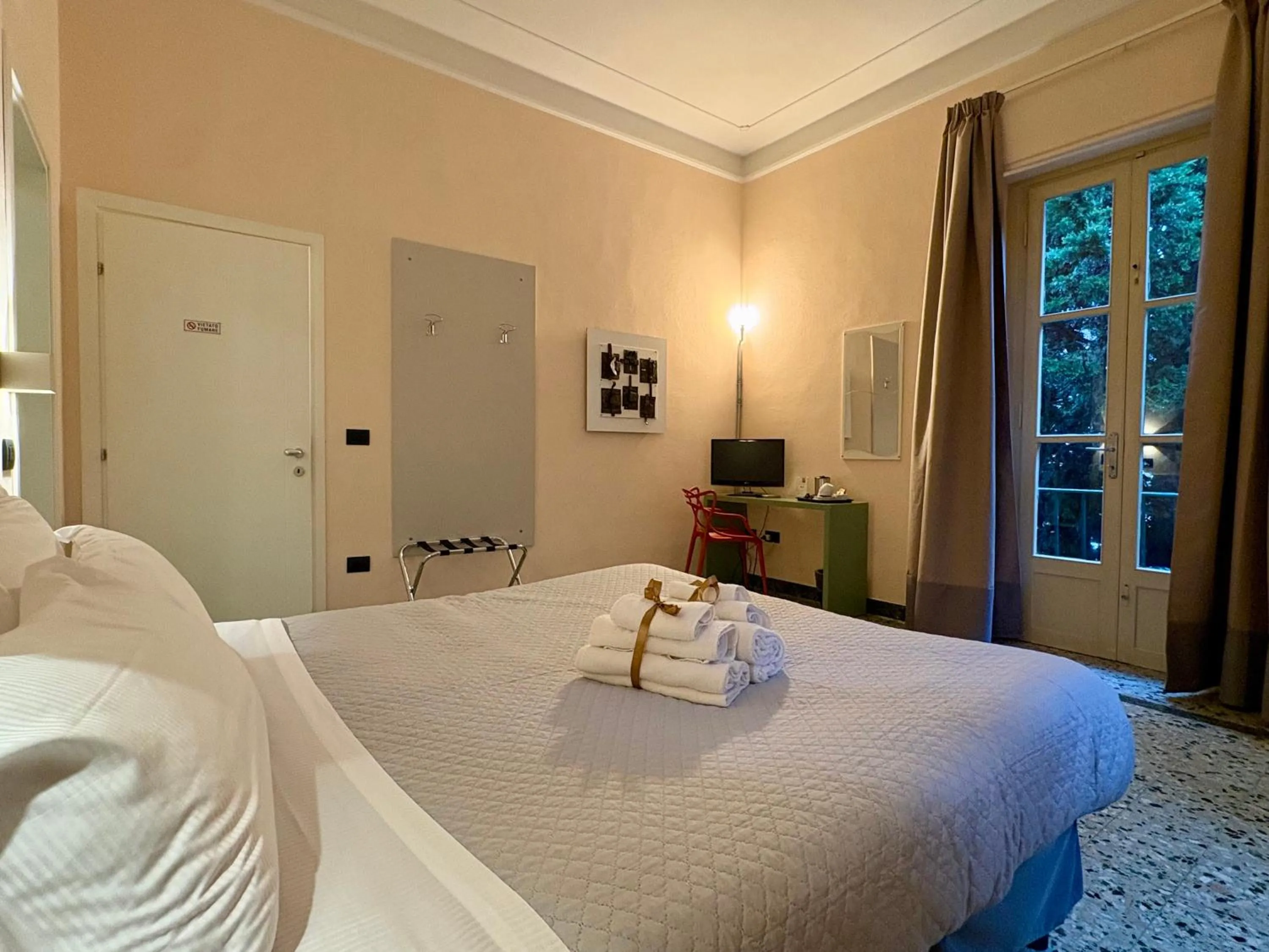 Bed in Lucca In Villa Elisa & Gentucca