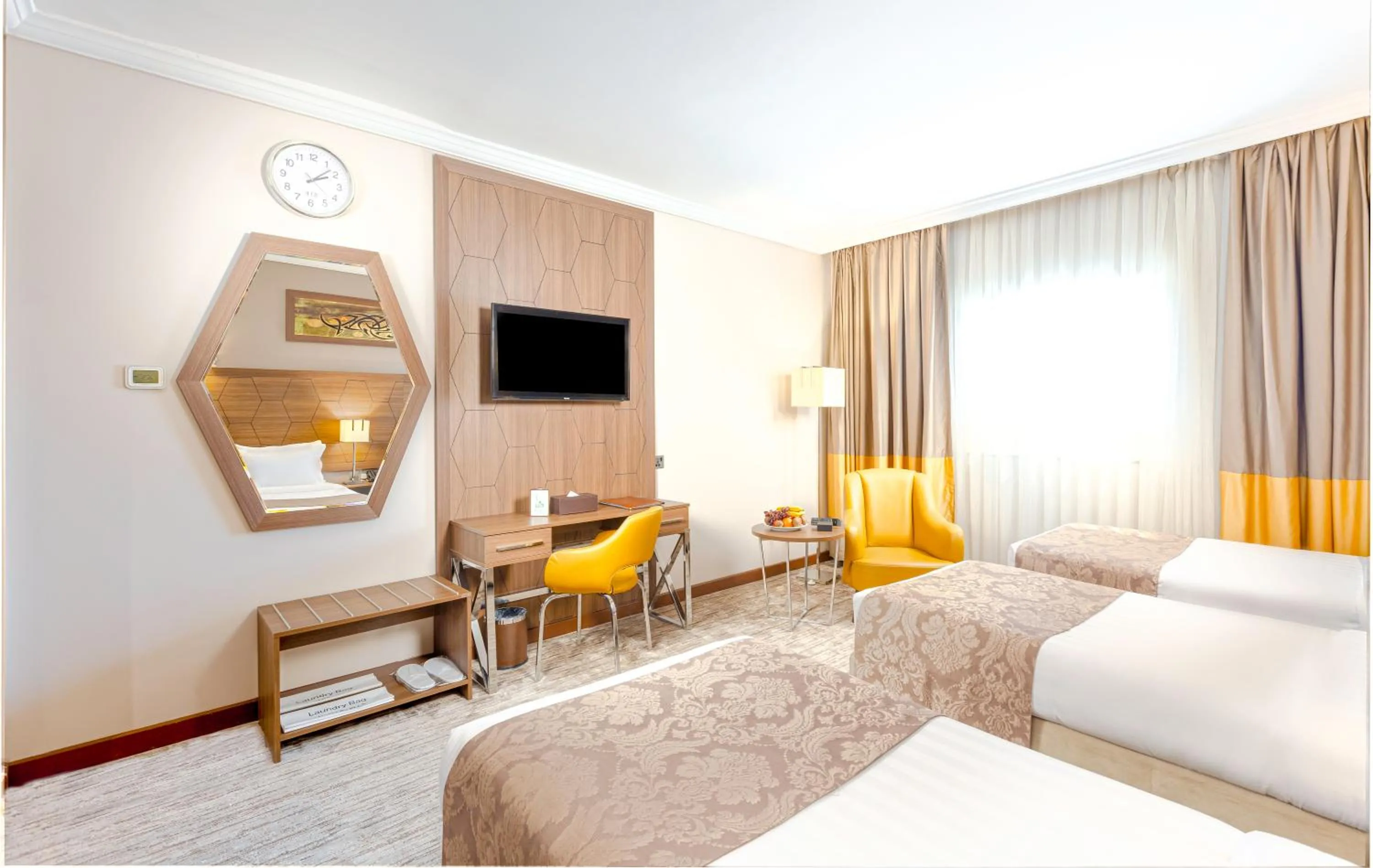 Bed in Diwan Rose Hotel