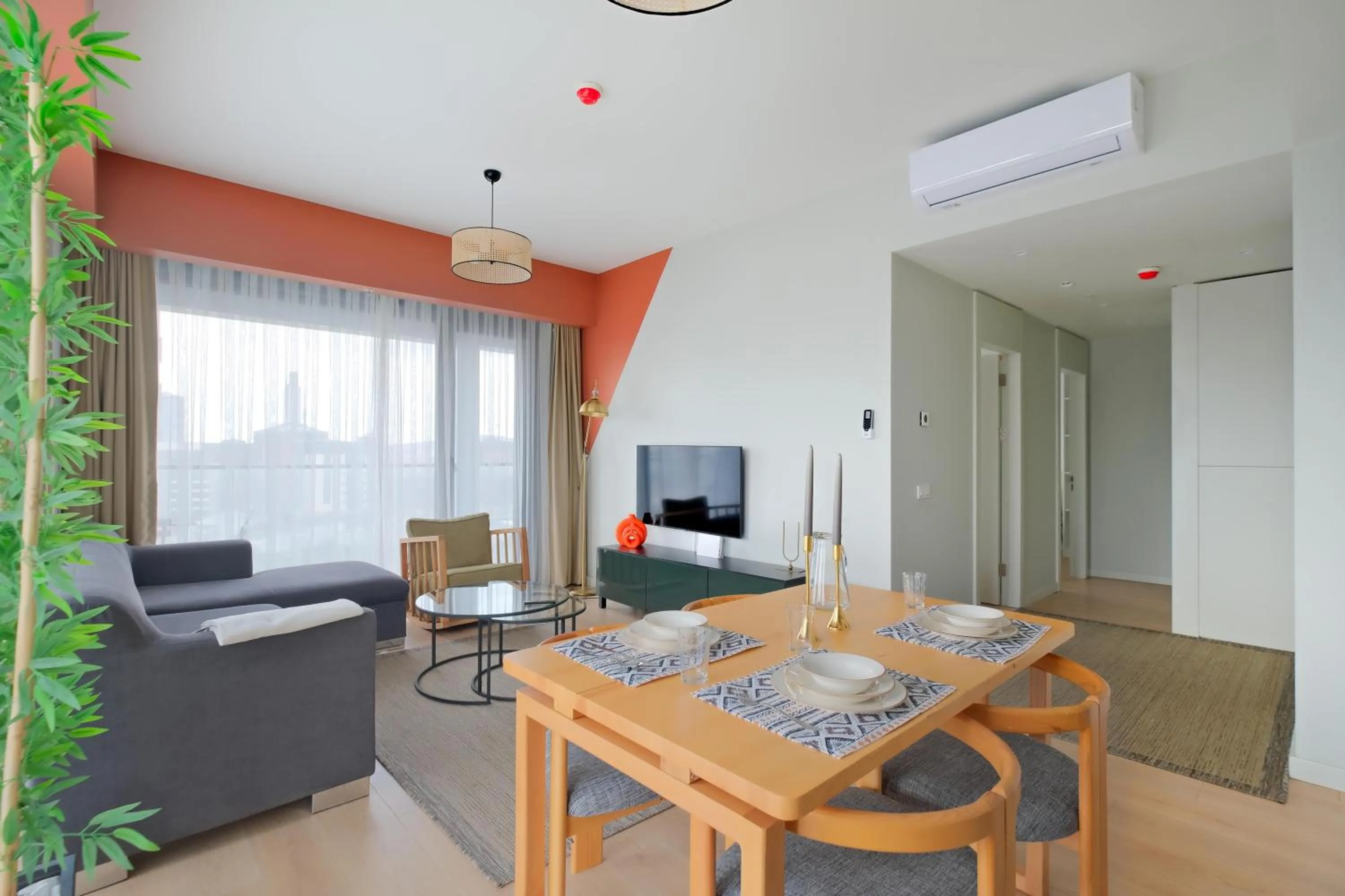 Dining area in Roya Nova Residence by NewInn