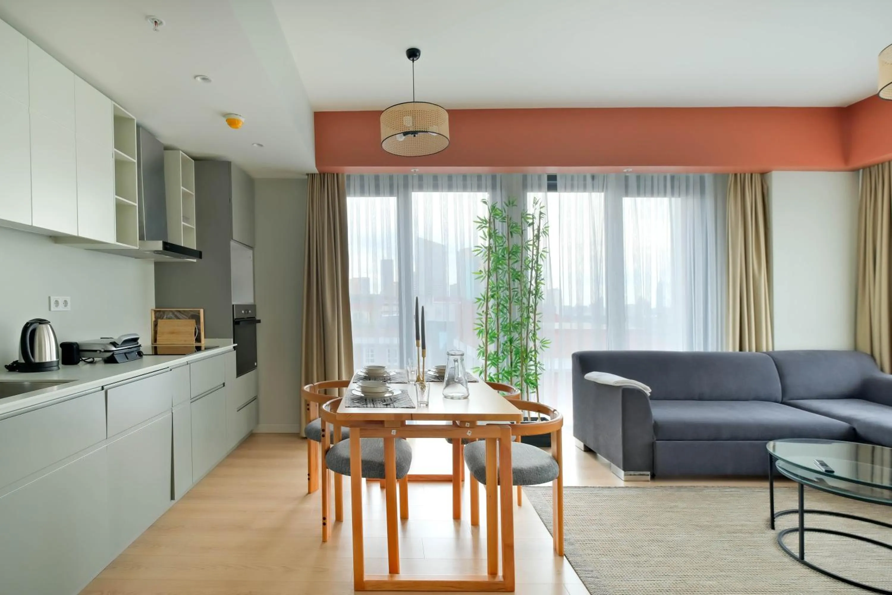 kitchen in Roya Nova Residence by NewInn