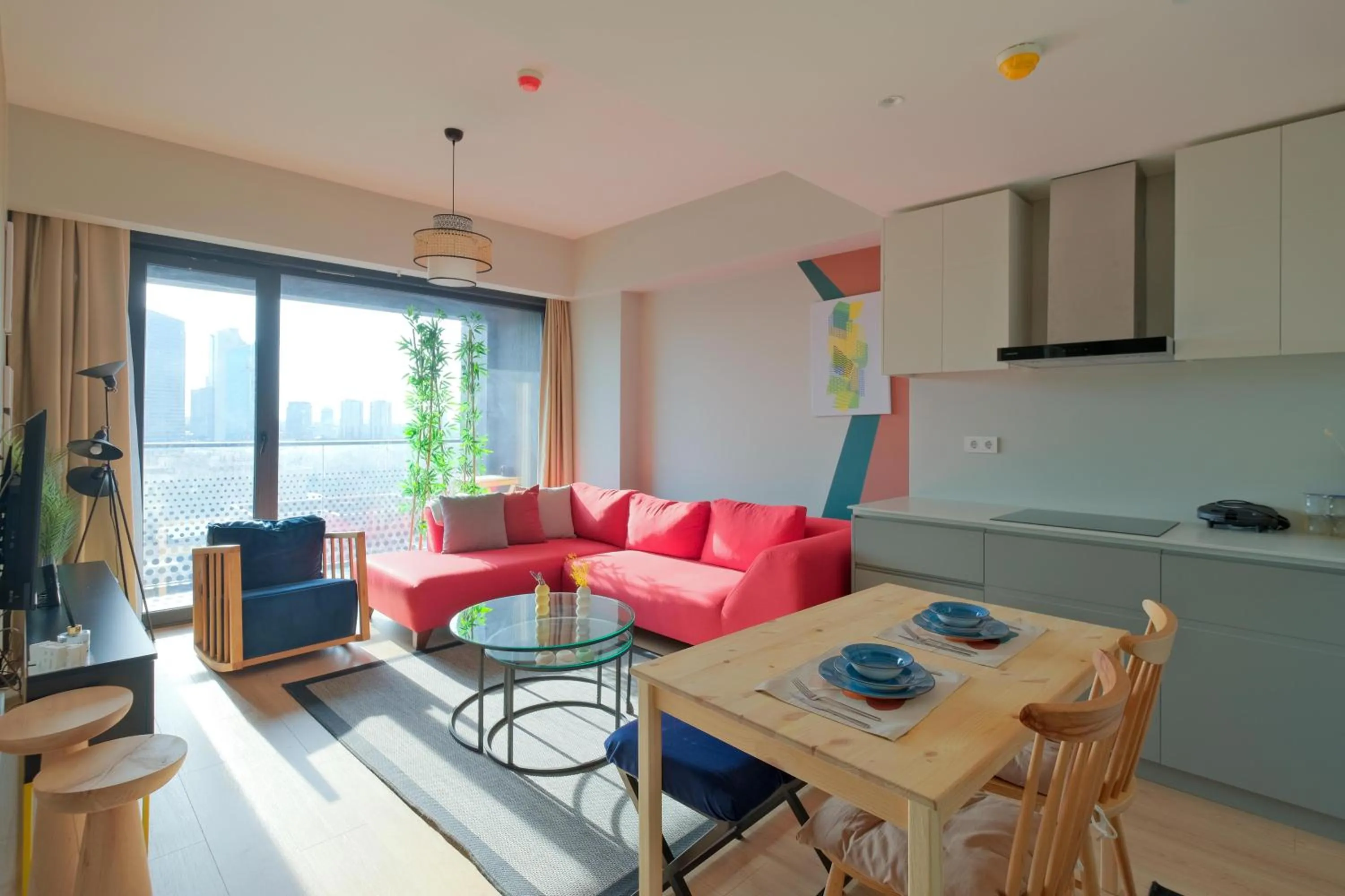 Living room in Roya Nova Residence by NewInn