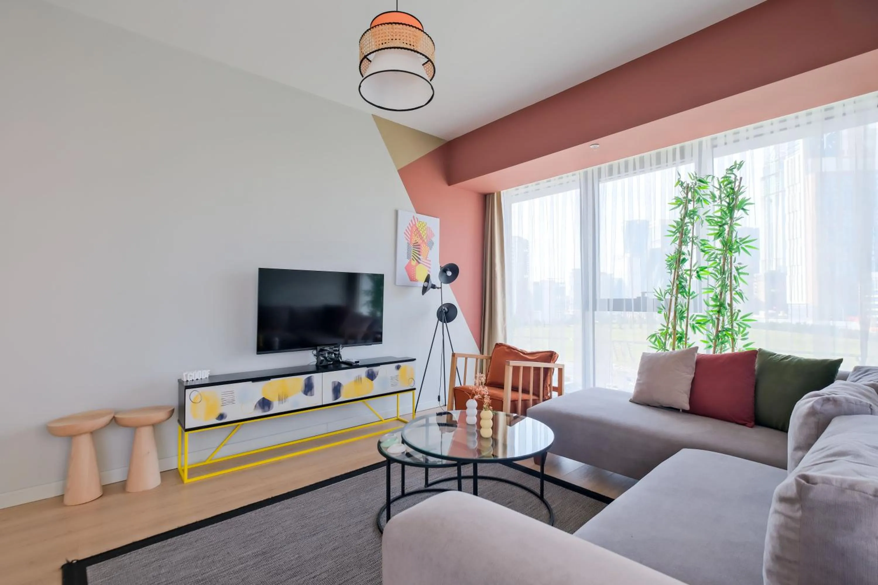 Living room in Roya Nova Residence by NewInn