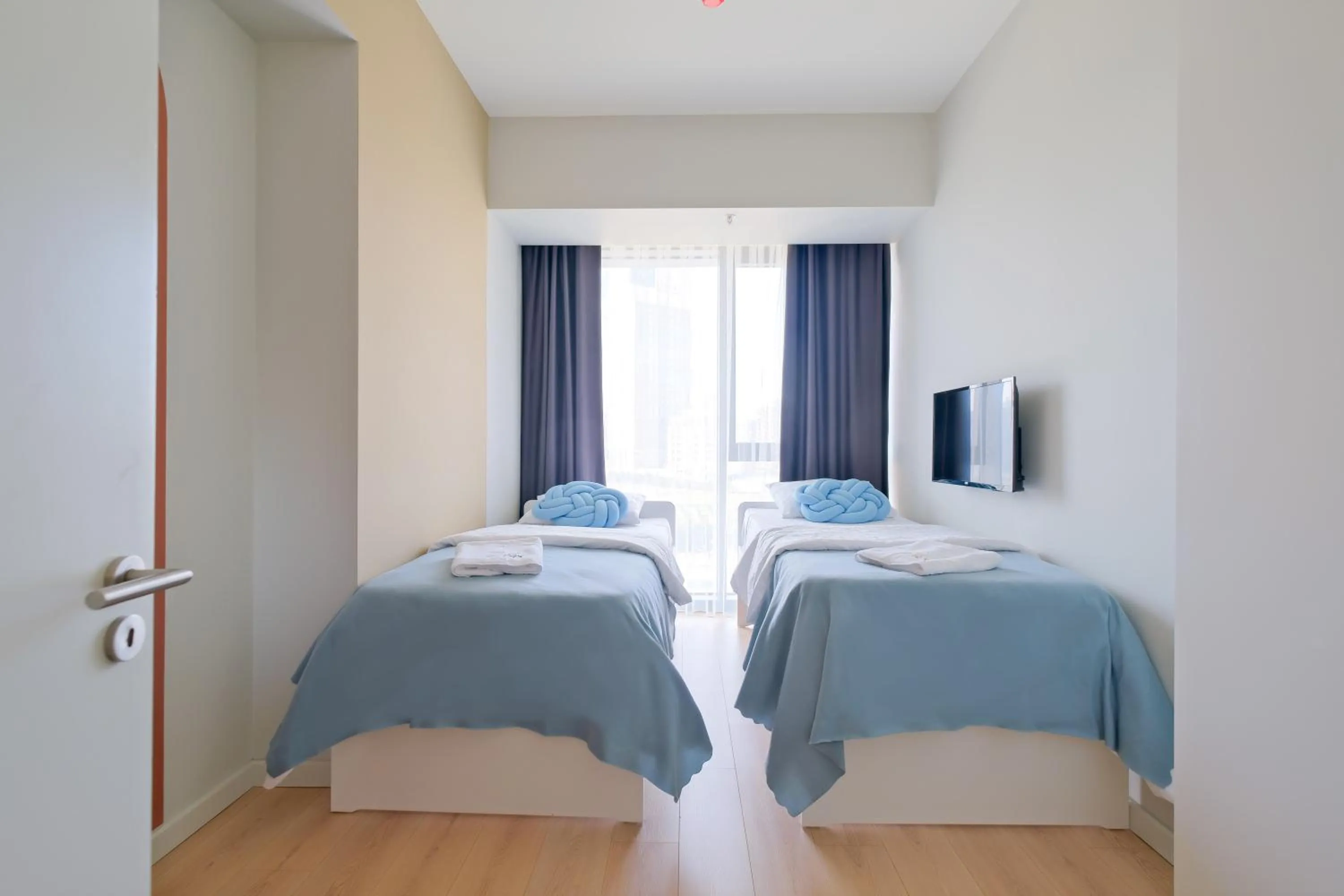 Bed in Roya Nova Residence by NewInn