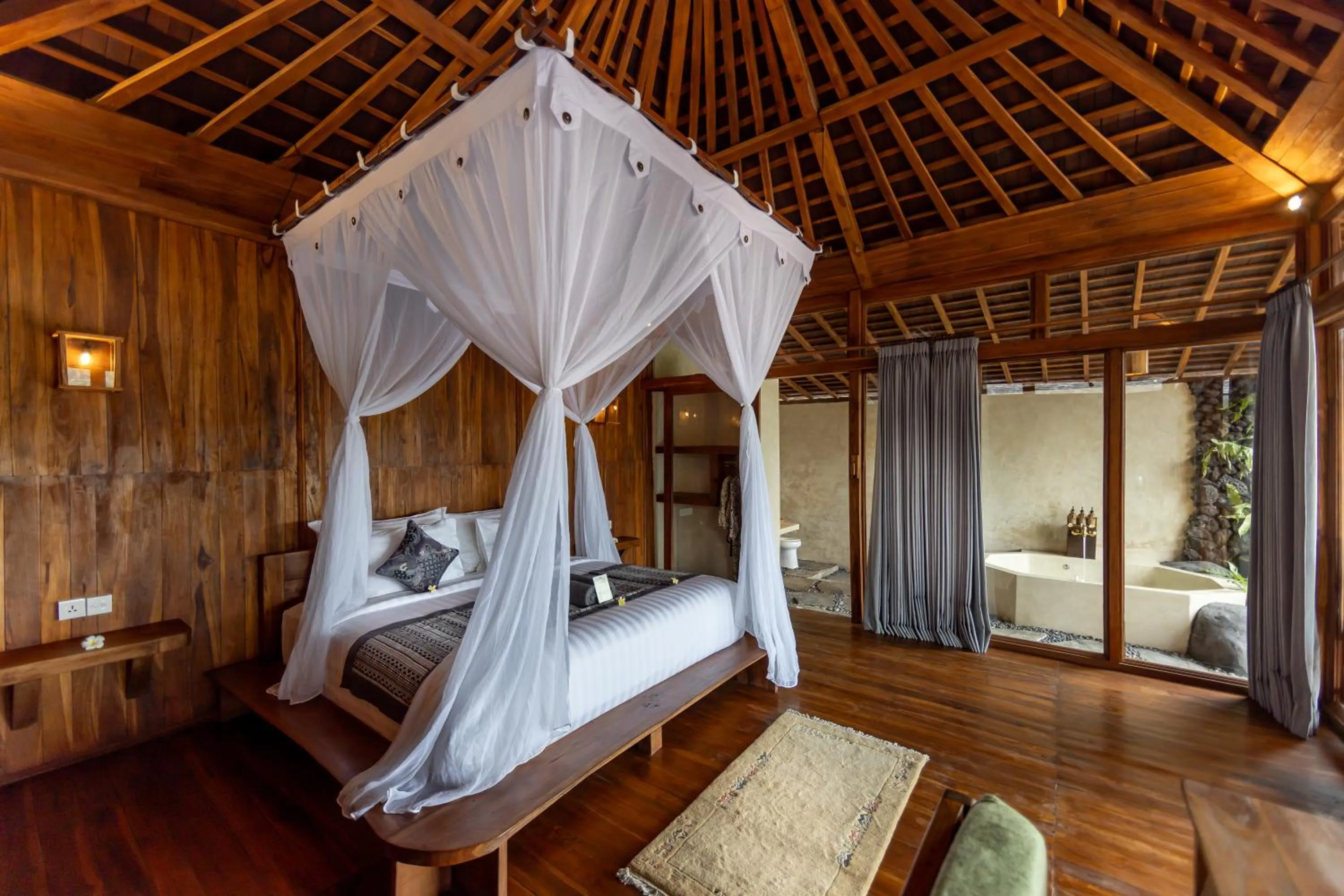 Bed in Joglo Organik Guesthouse