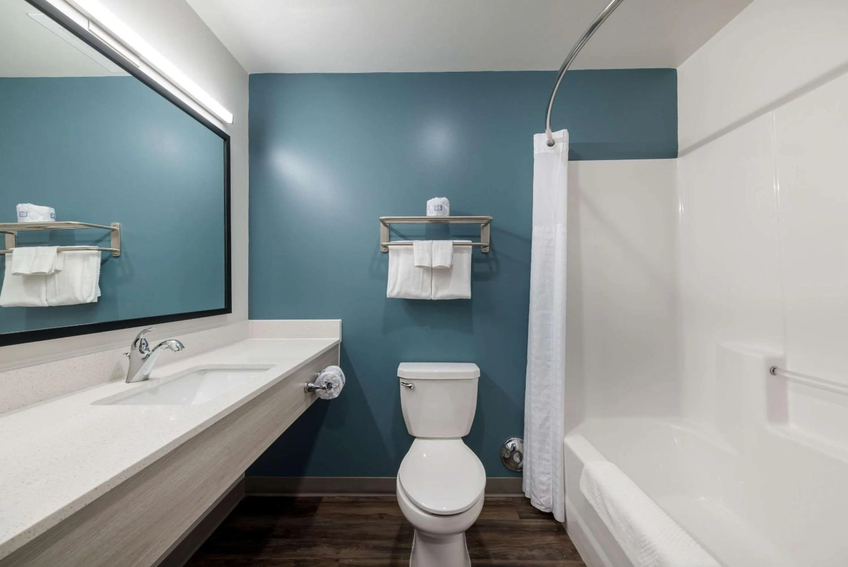 Bathroom in WoodSpring Suites Greensboro - High Point North