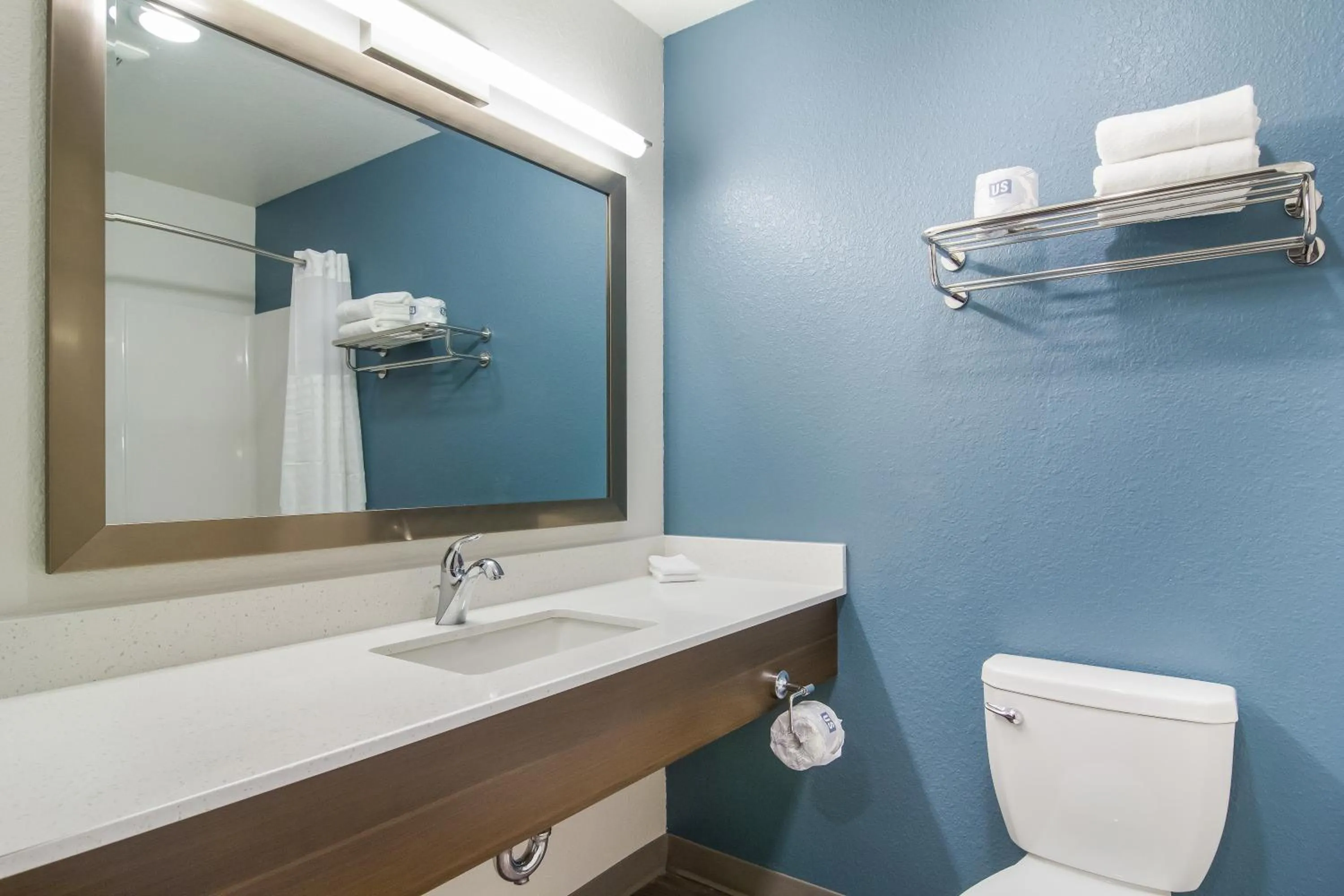 Bathroom in WoodSpring Suites Greensboro - High Point North