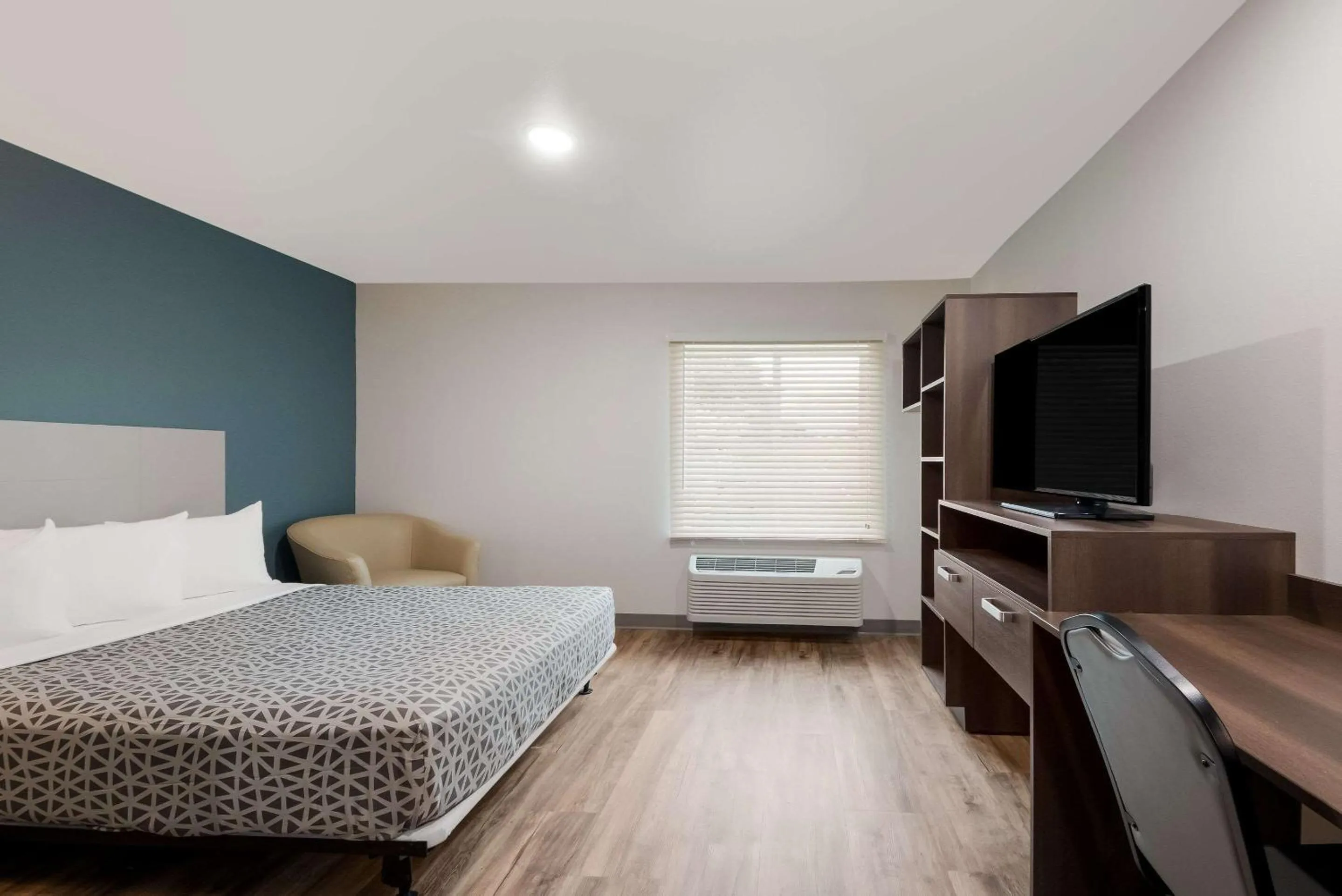 Photo of the whole room, Bed in WoodSpring Suites San Antonio UTSA - Medical Center