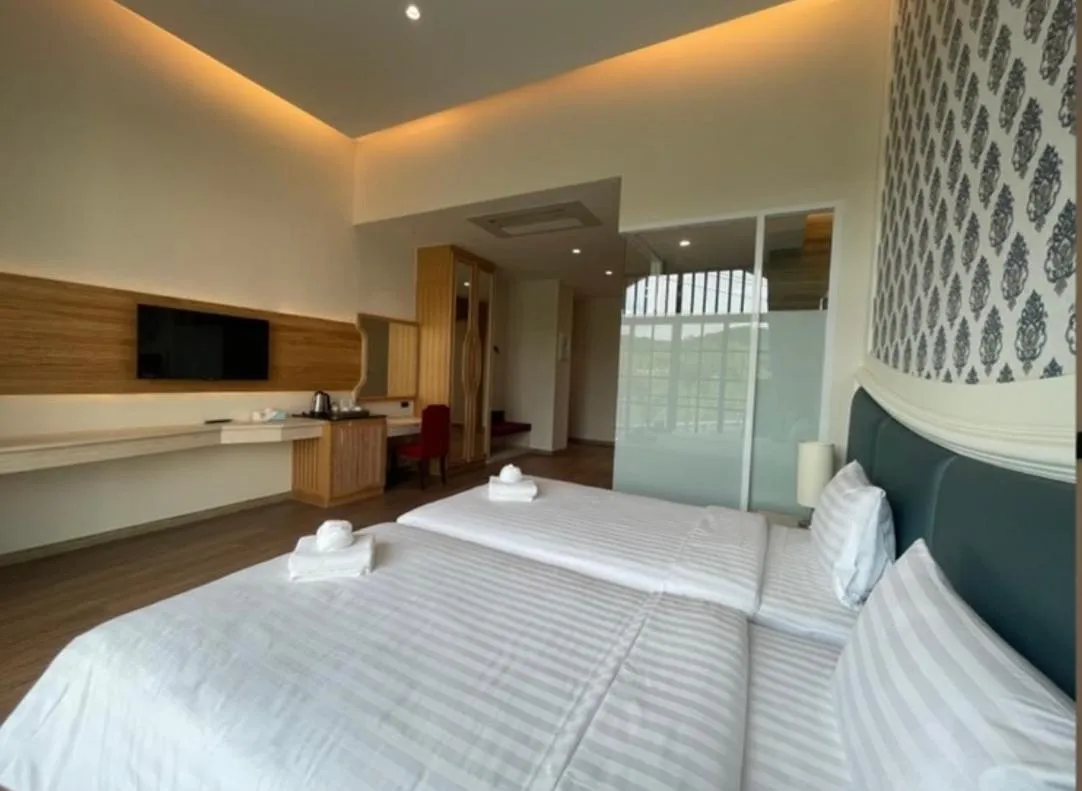 Bedroom, Bed in Grand Lord Hotel & Residence - Pattaya
