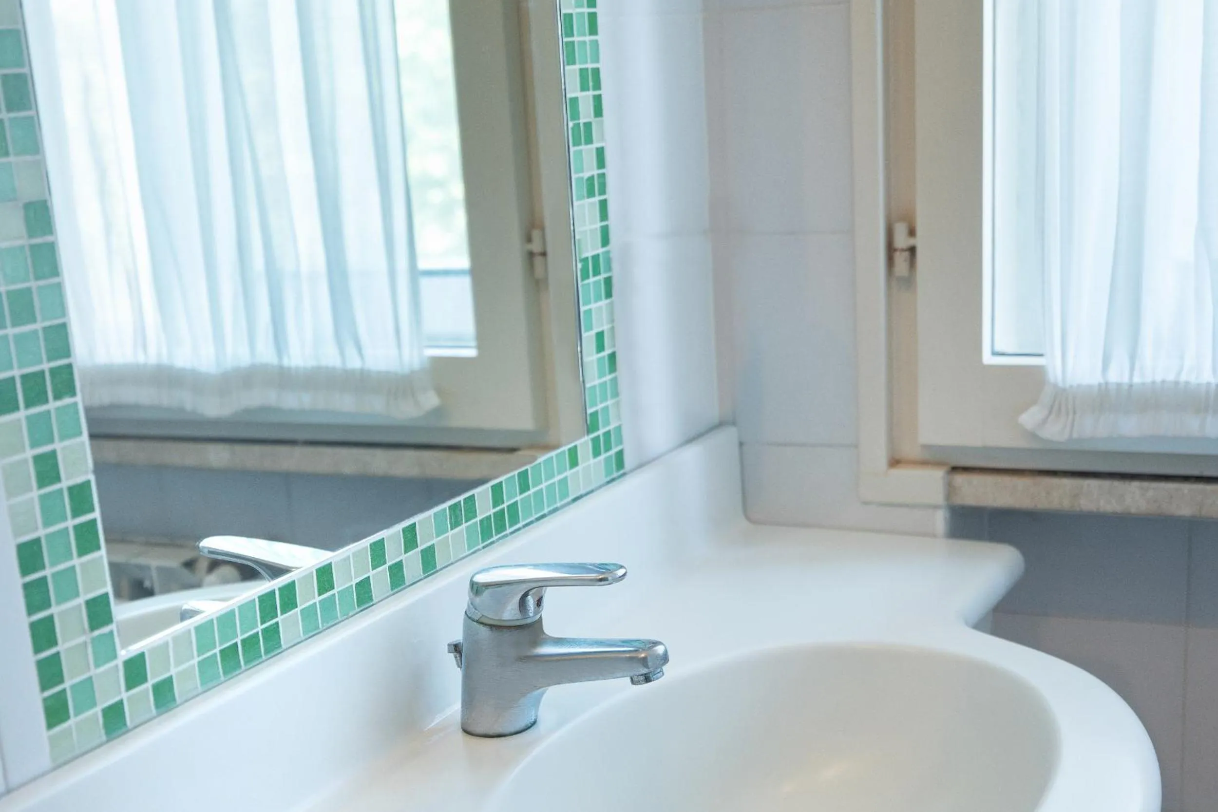 Bathroom in Hotel Mosaico