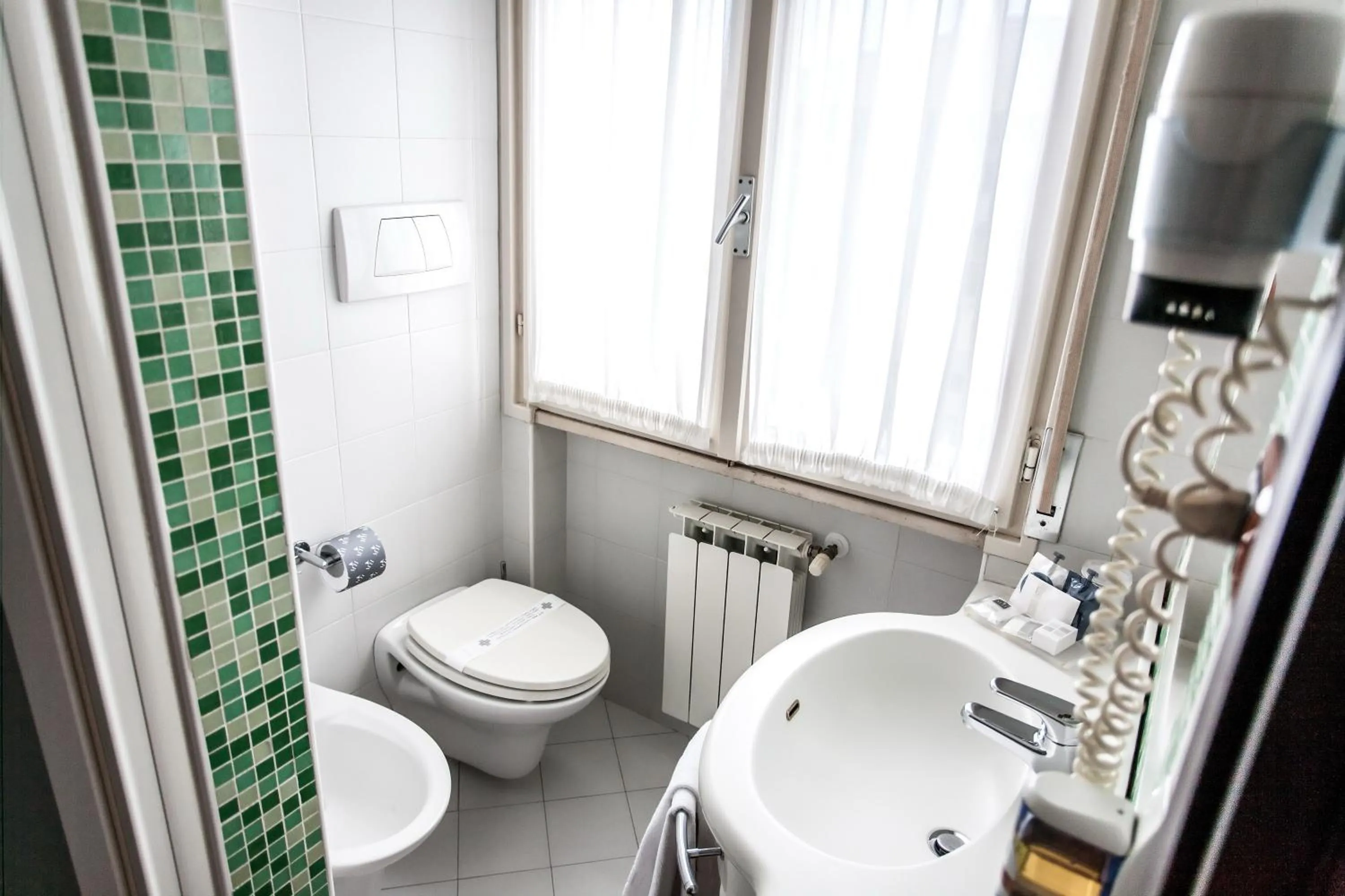 Bathroom in Hotel Mosaico