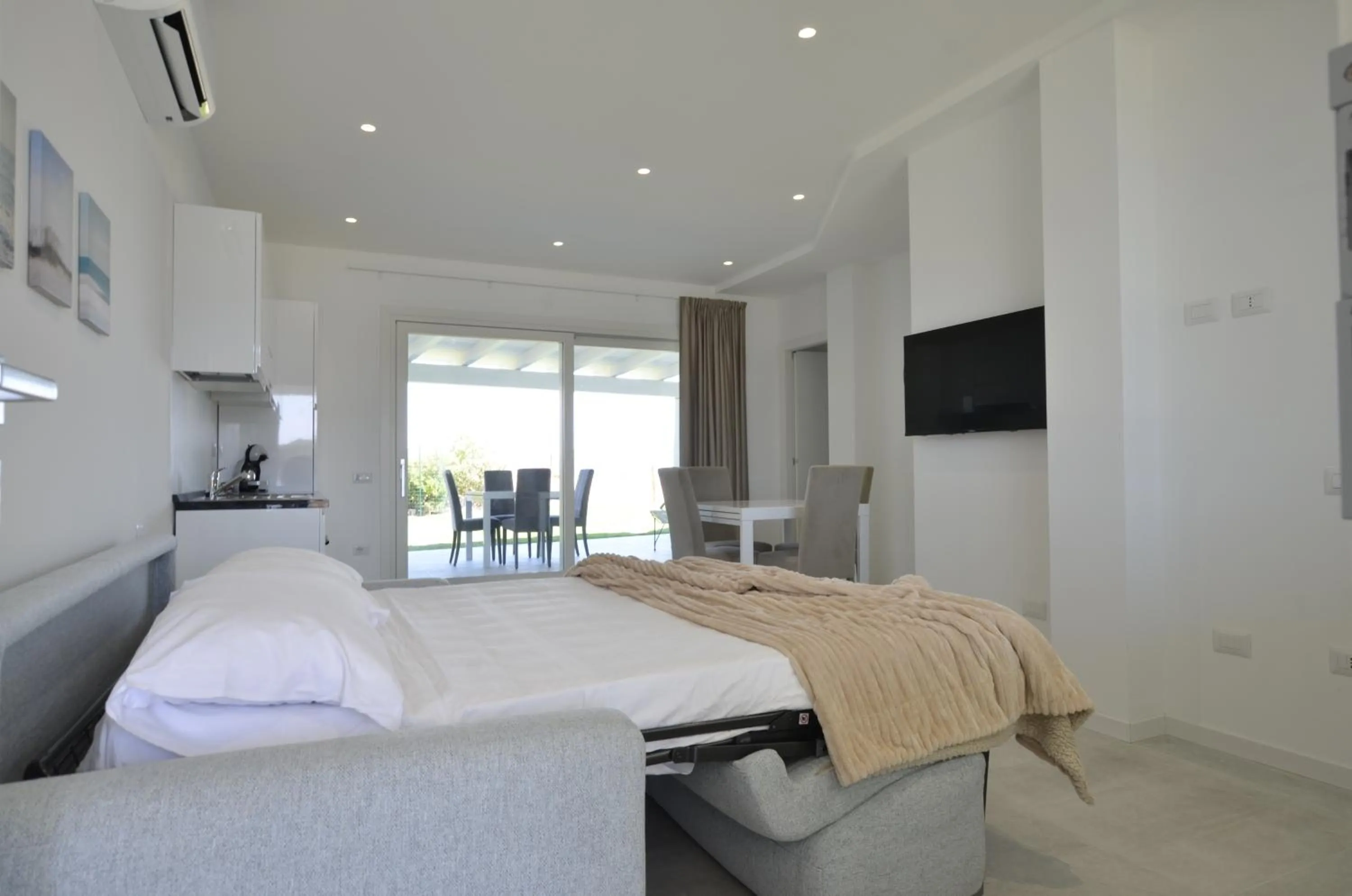 Living room, Bed in Baia del Sole Resort