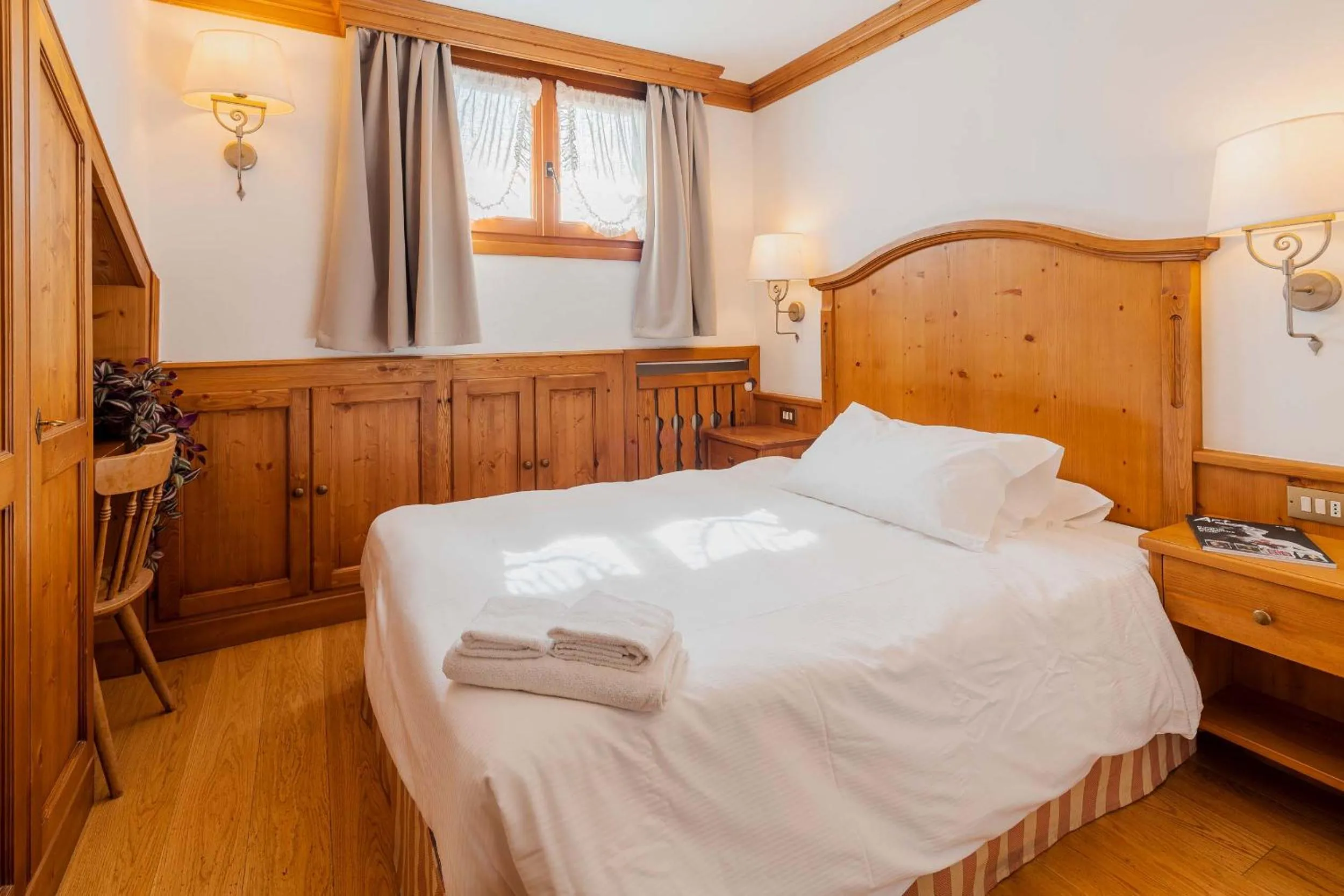 Bed in Royal Hotel Cortina