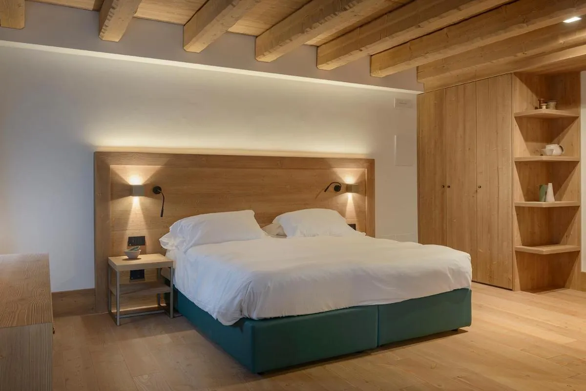 Bed in Royal Hotel Cortina