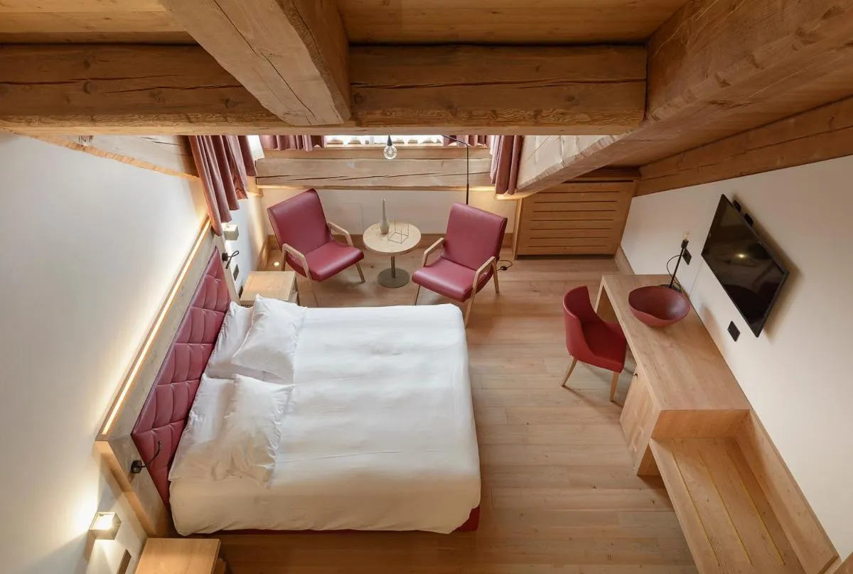 Bed in Royal Hotel Cortina