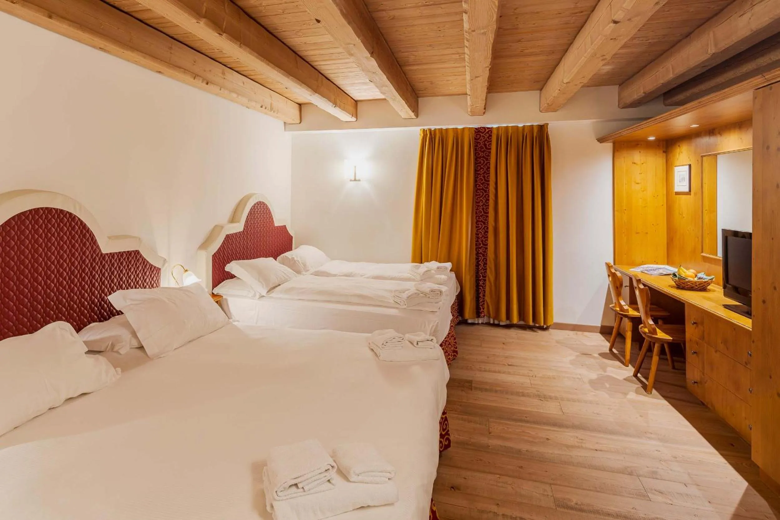 Bed in Royal Hotel Cortina