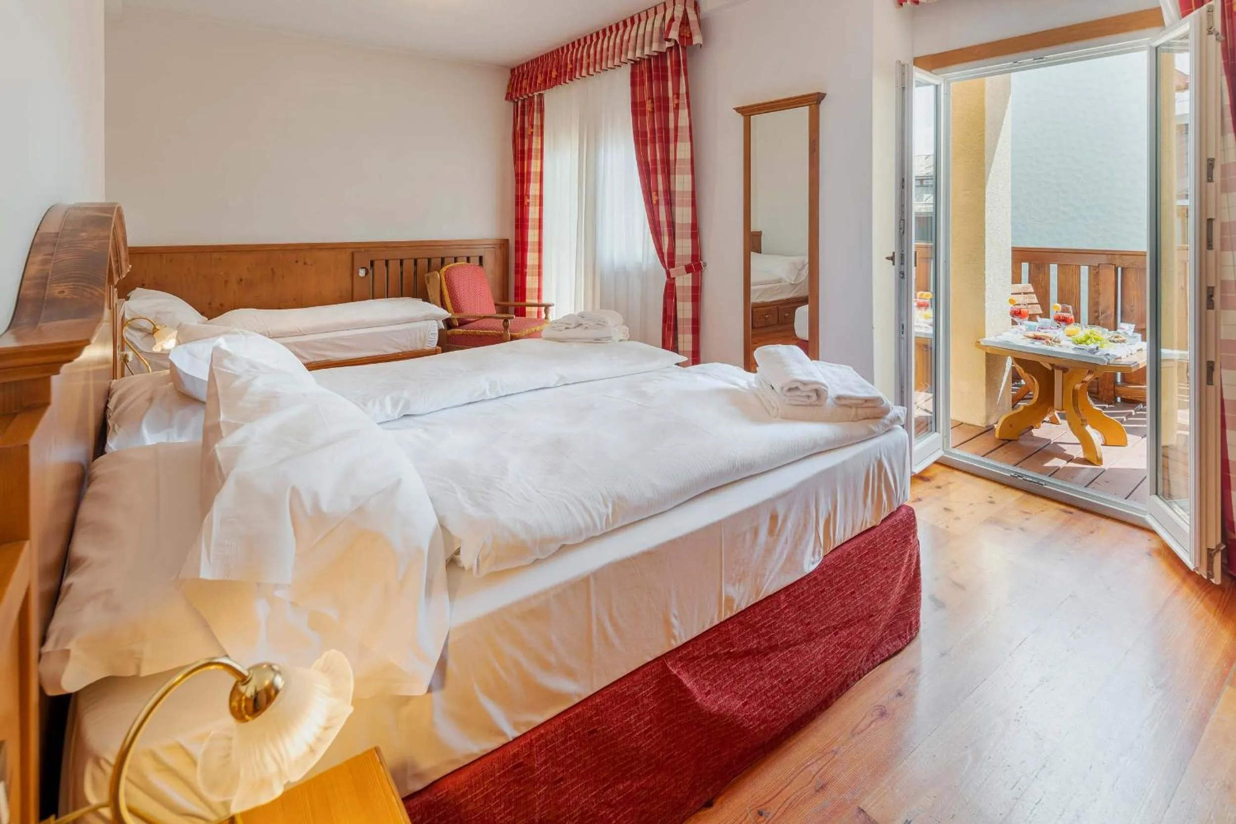 Bed in Royal Hotel Cortina