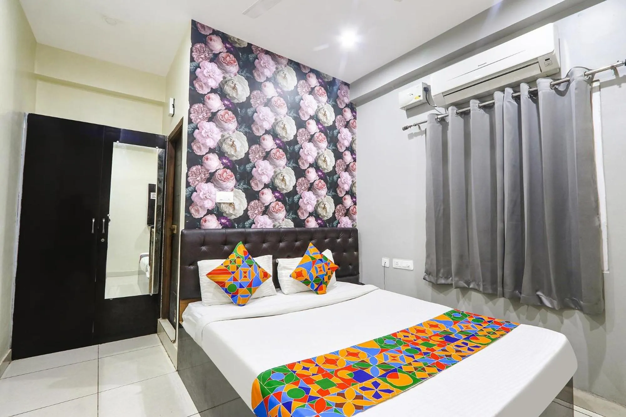 Bed in FabHotel Galaxy Suites