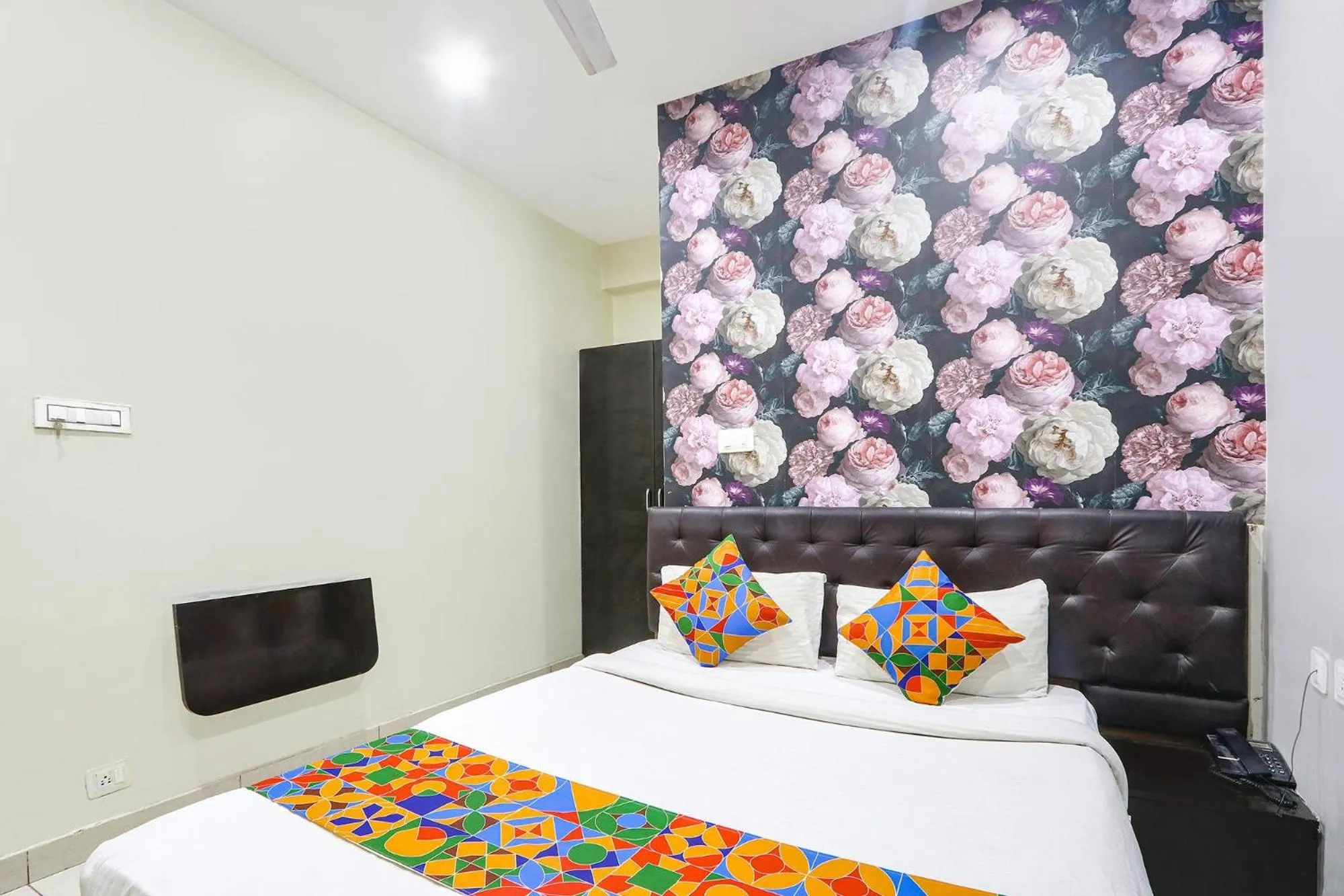 Bed in FabHotel Galaxy Suites