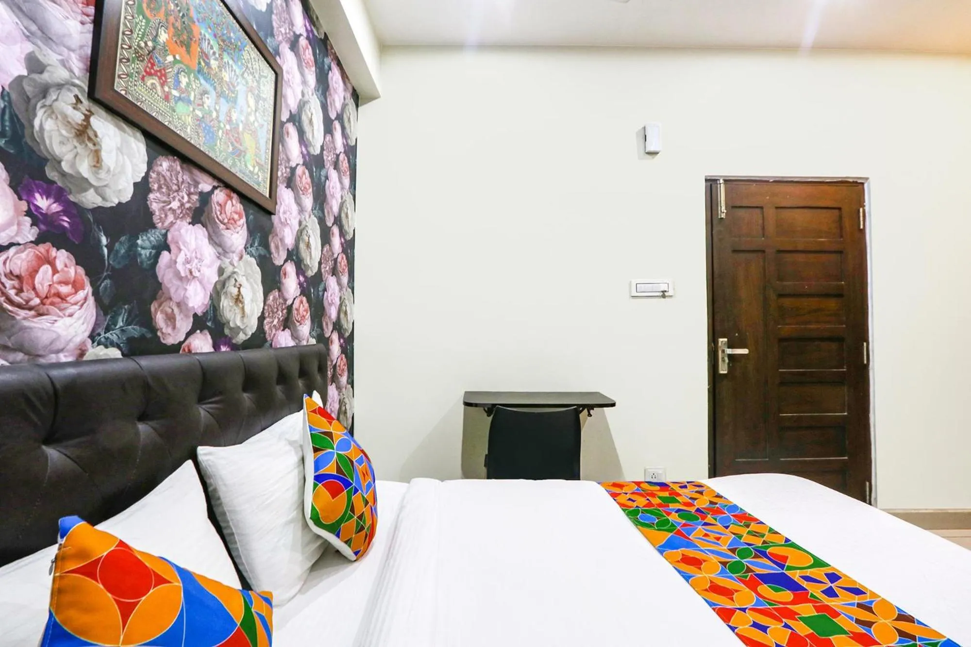 Bed in FabHotel Galaxy Suites