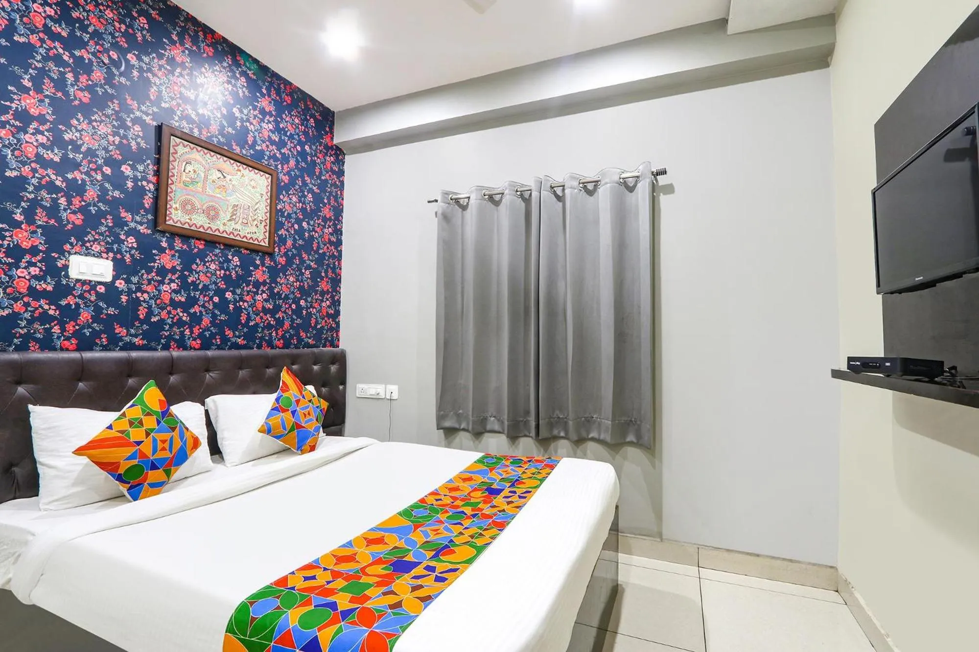 Bed in FabHotel Galaxy Suites