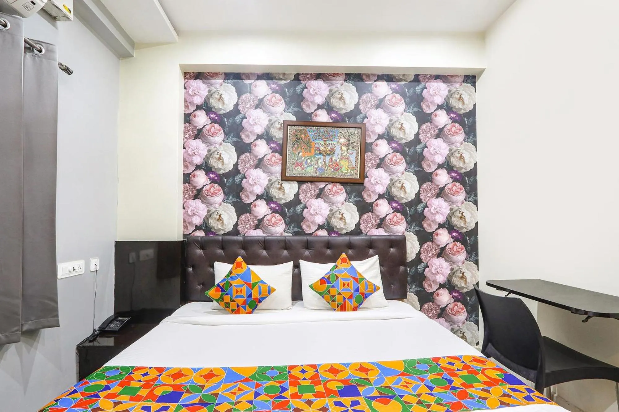 Bed in FabHotel Galaxy Suites