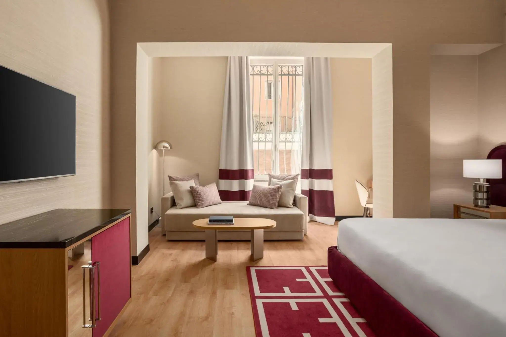 Seating area, Bed in Room Mate Collection Mia, Rome Colosseum Seating area, Bed in Room Mate Collection Mia, Rome Colosseum