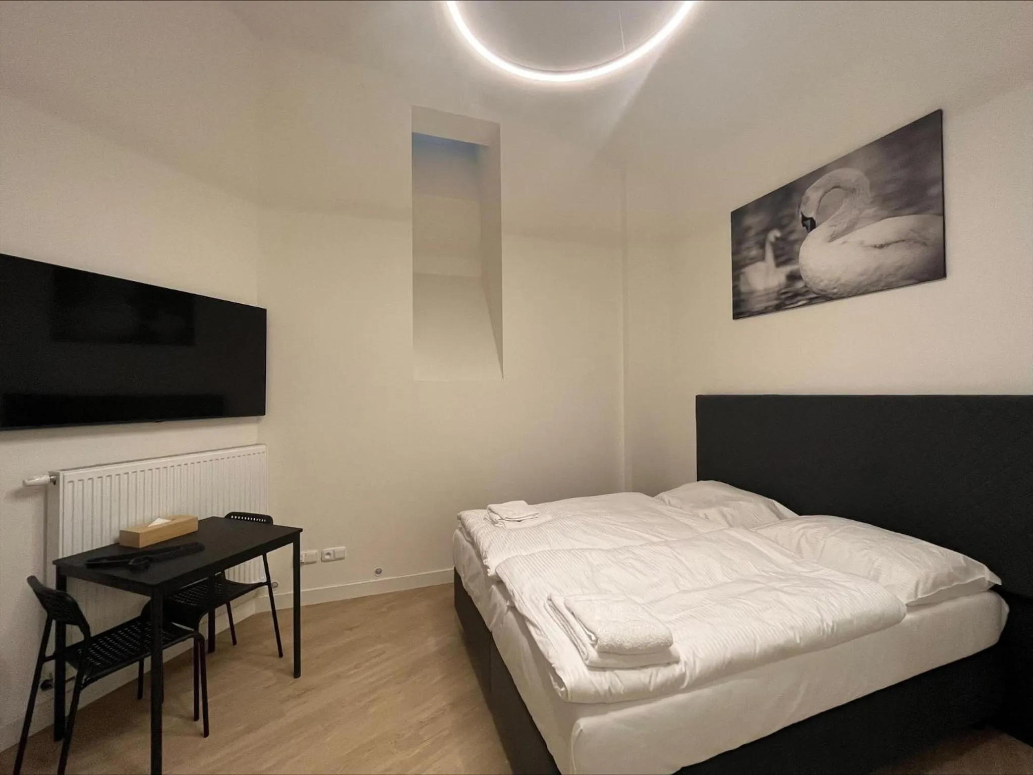 Bed in Figaro Suites