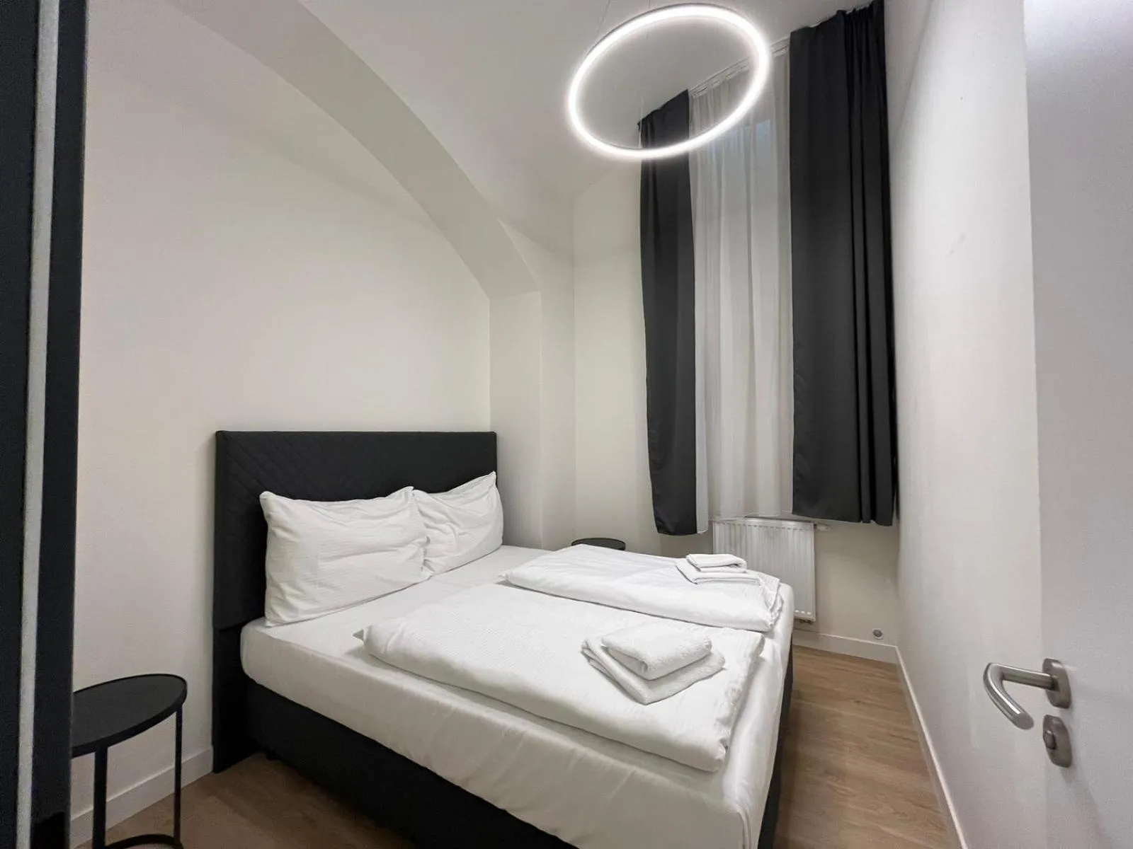 Bed in Figaro Suites